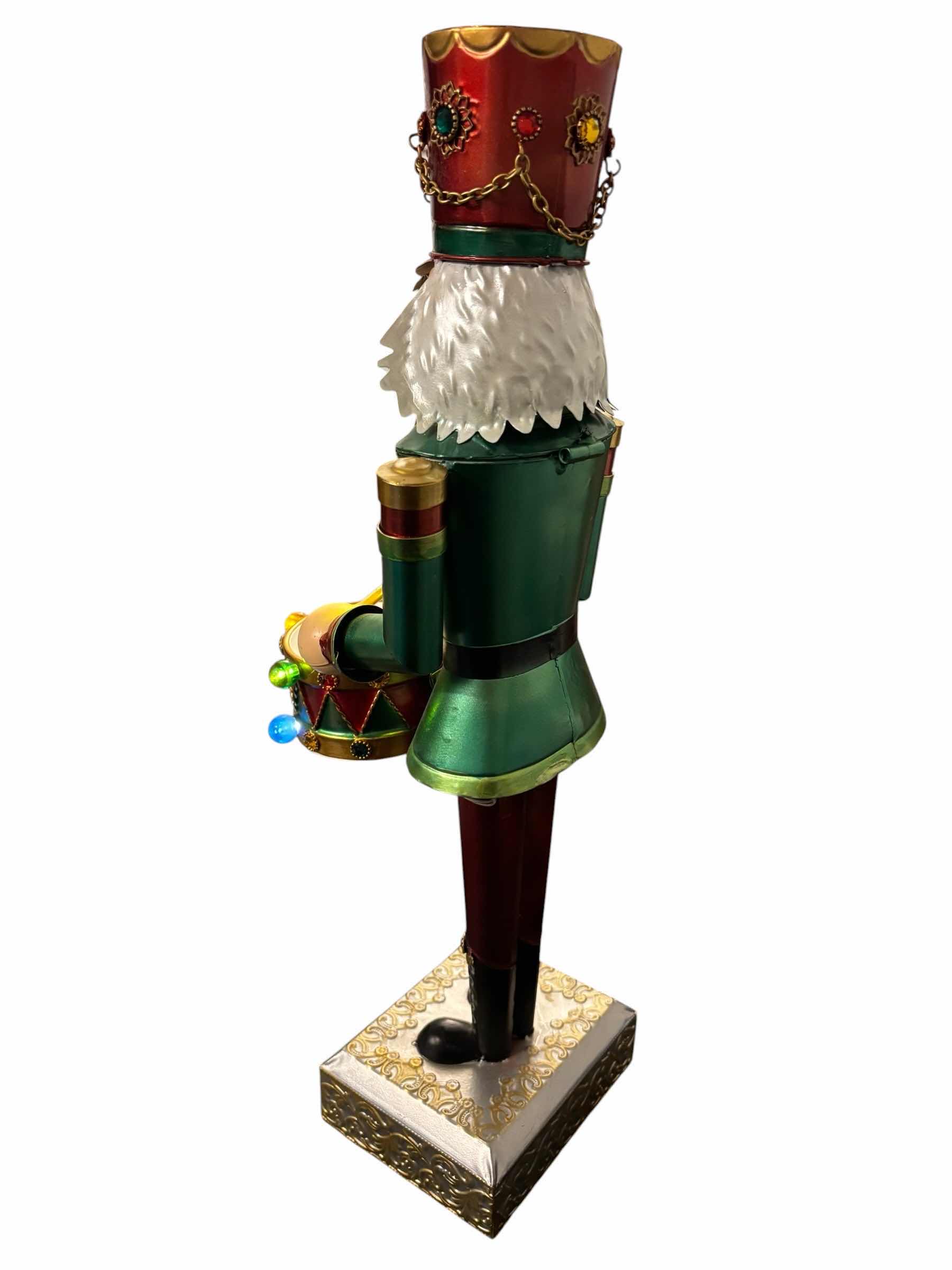 Photo 1 of 21” TIN LIGHT-UP NUTCRACKER $55