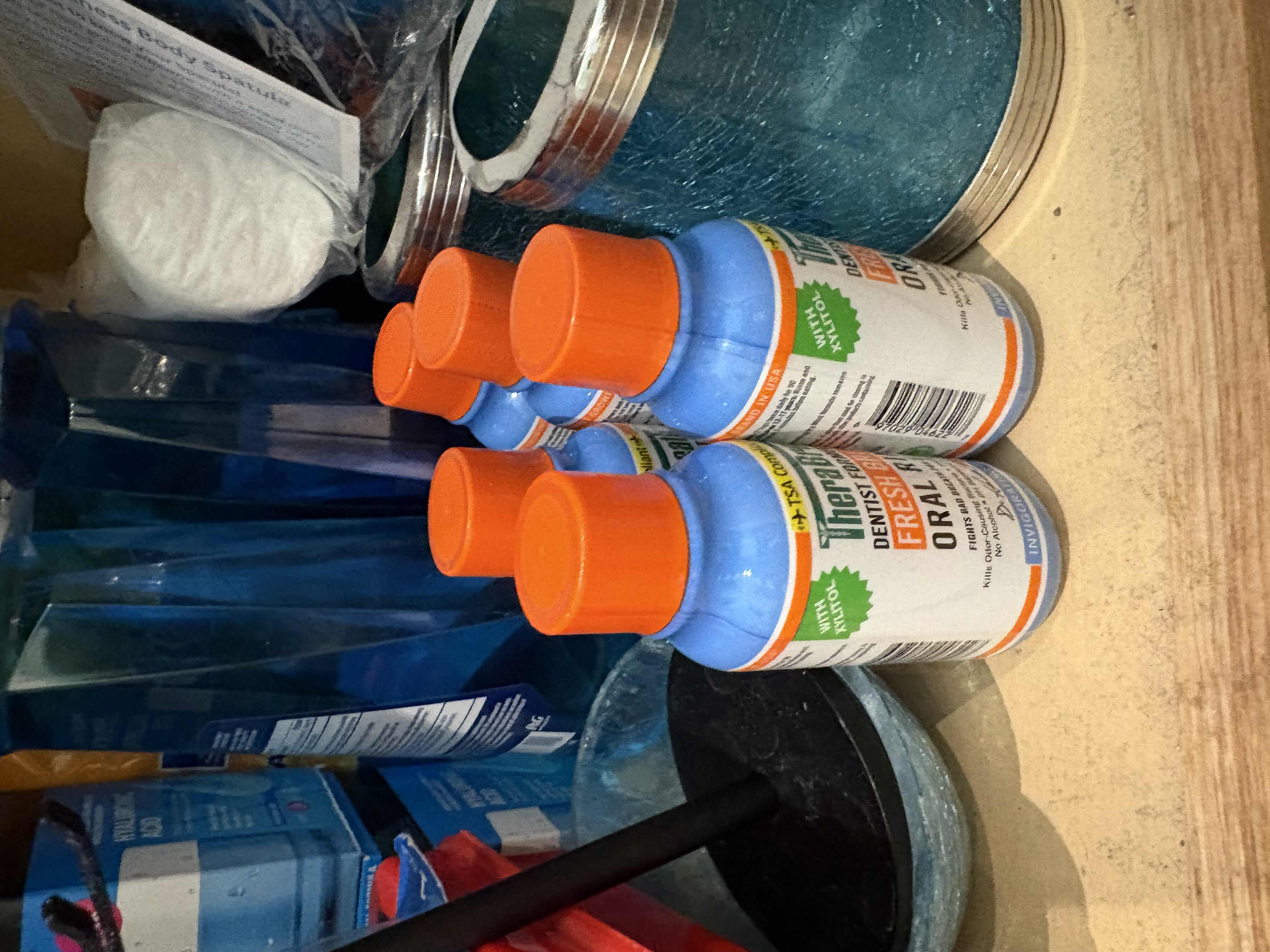 Photo 1 of CONTENTS OF PRIMARY BATHROOM CABINET NEW MOUTHWASH, TOOTHPASETE AND MORE
