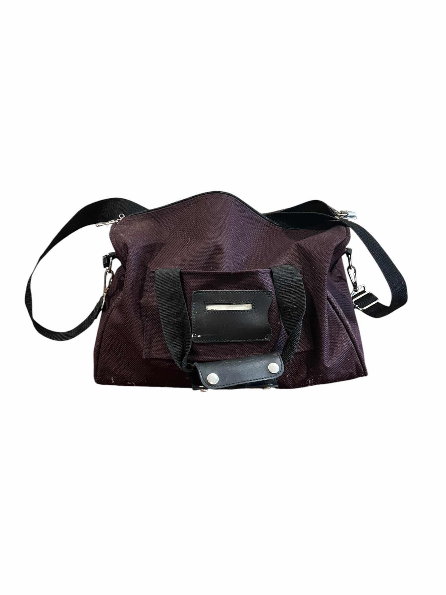 Photo 1 of DUFFLE BAG WITH AMMO AND GUN CLEANING SUPPLIES