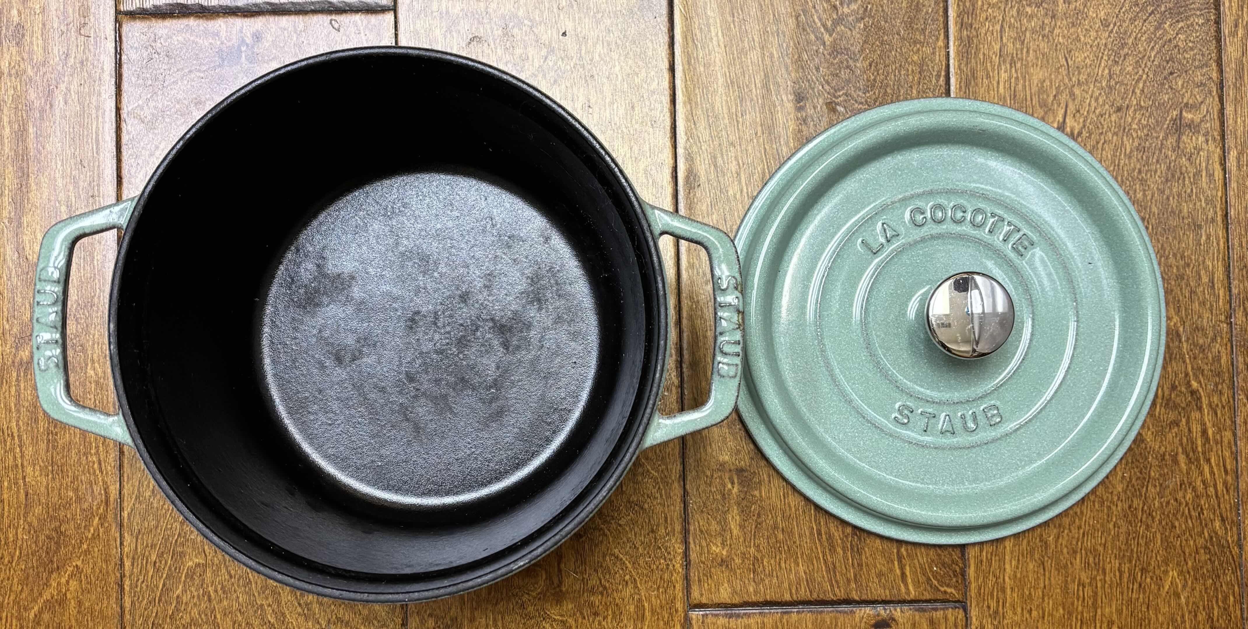 Photo 1 of CONTENTS OF KITCHEN CABINET: DUTCH OVENS (2), CAST IRON SKILLET, AIR FRYER & MORE