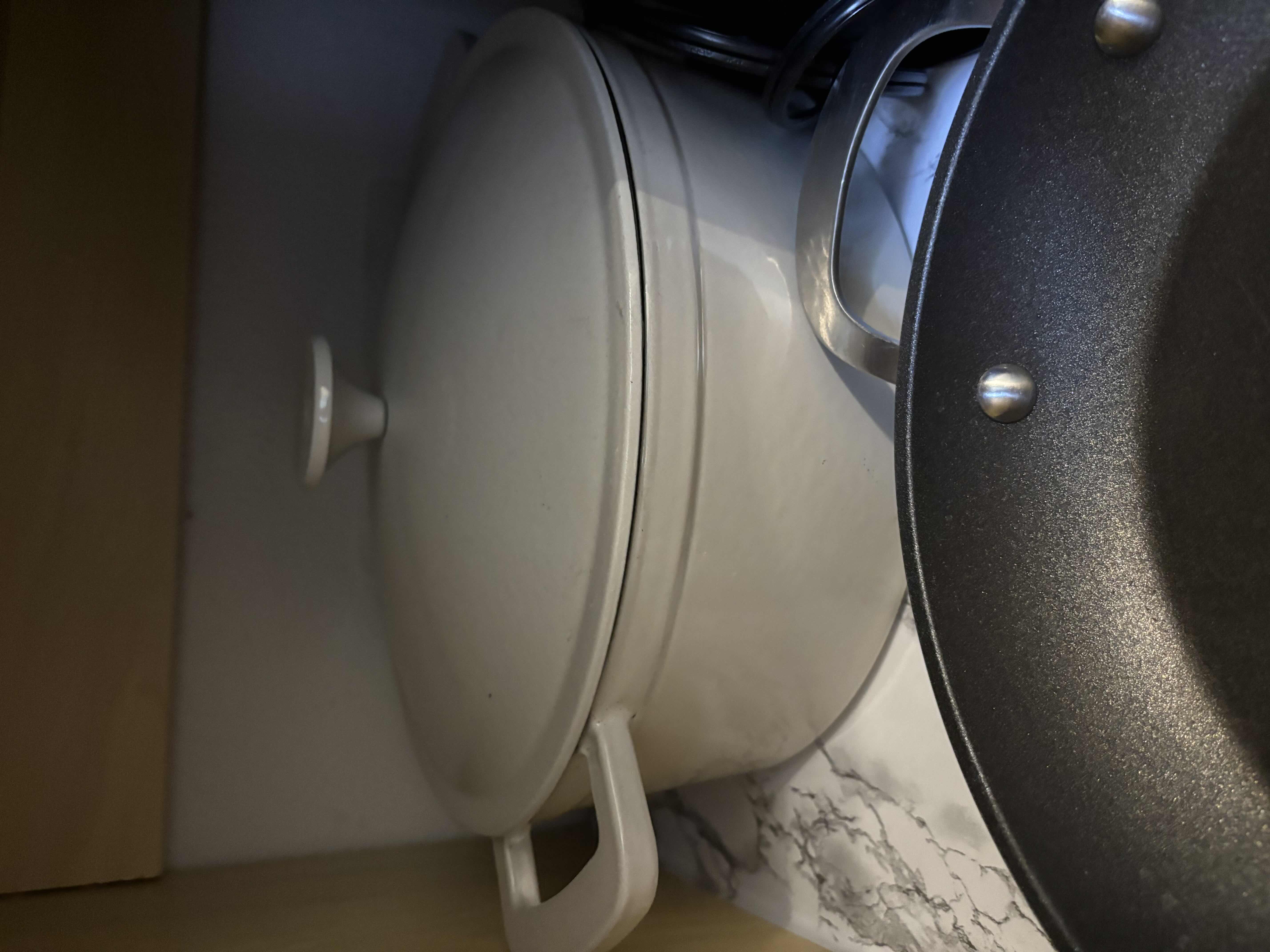 Photo 1 of CONTENTS OF KITCHEN CABINET: DUTCH OVENS (2), CAST IRON SKILLET, AIR FRYER & MORE