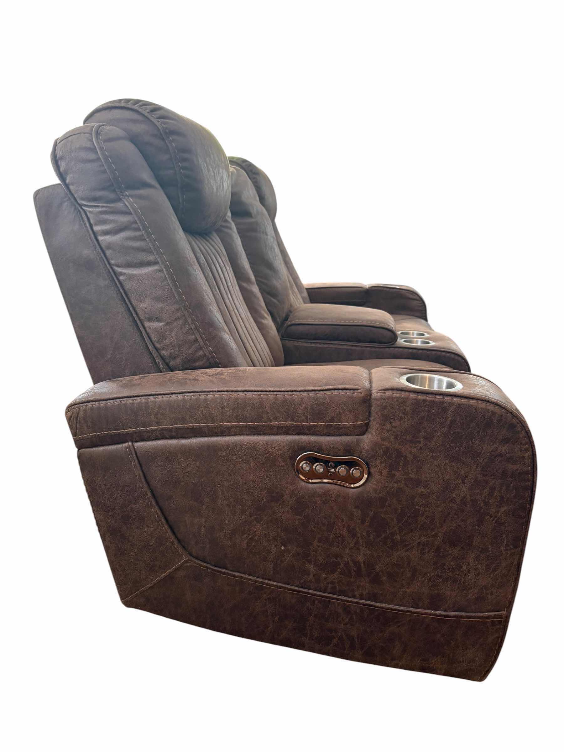 Photo 1 of BROWN LEATHER POWER LOVESEAT RECLINER W ADJUSTABLE HEADREST 71”X32”H41.5” $2499