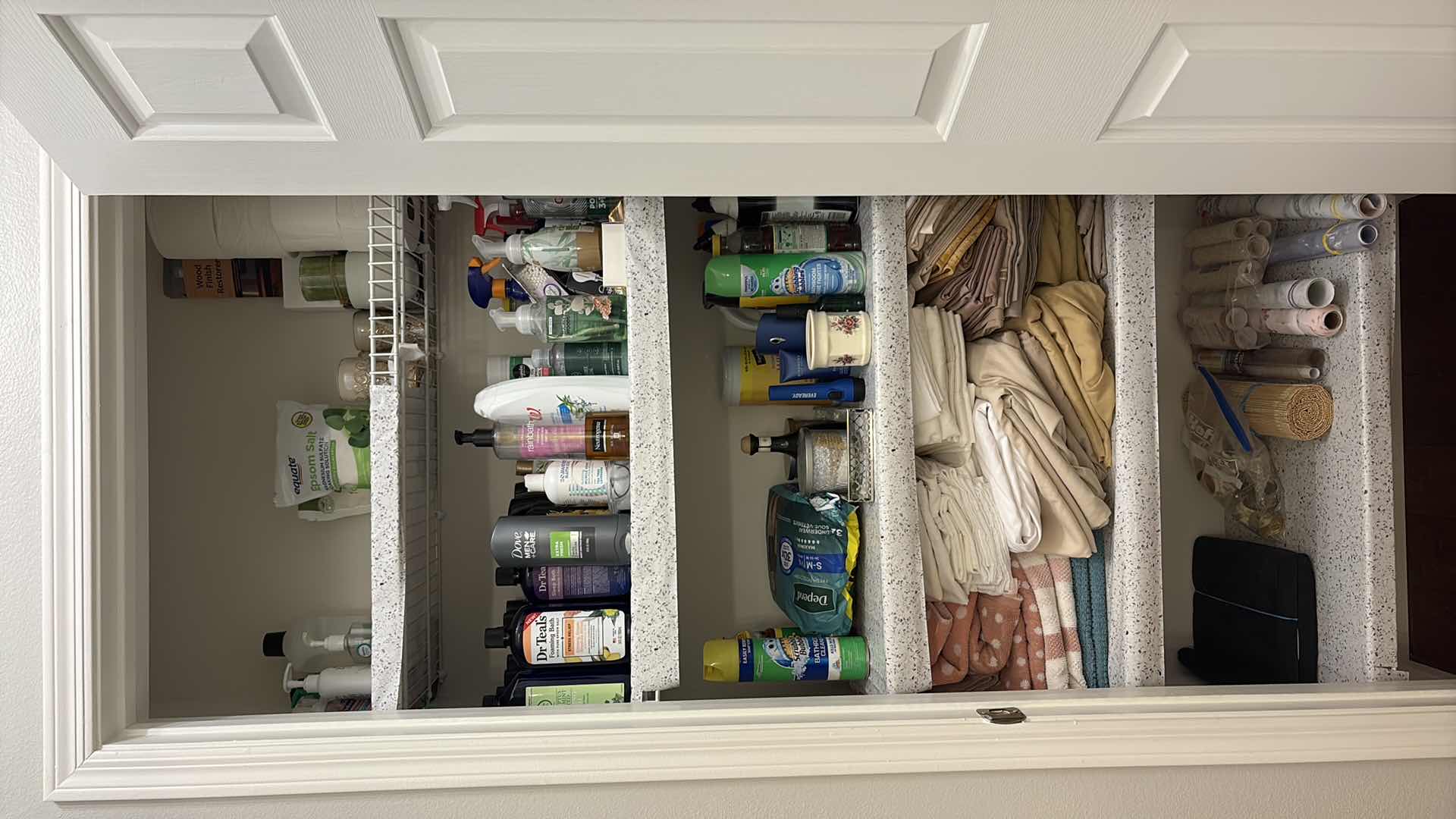 Photo 1 of HALLWAY CLOSET OF HYGIENE PRODUCTS AND CLEANING SUPPLIES