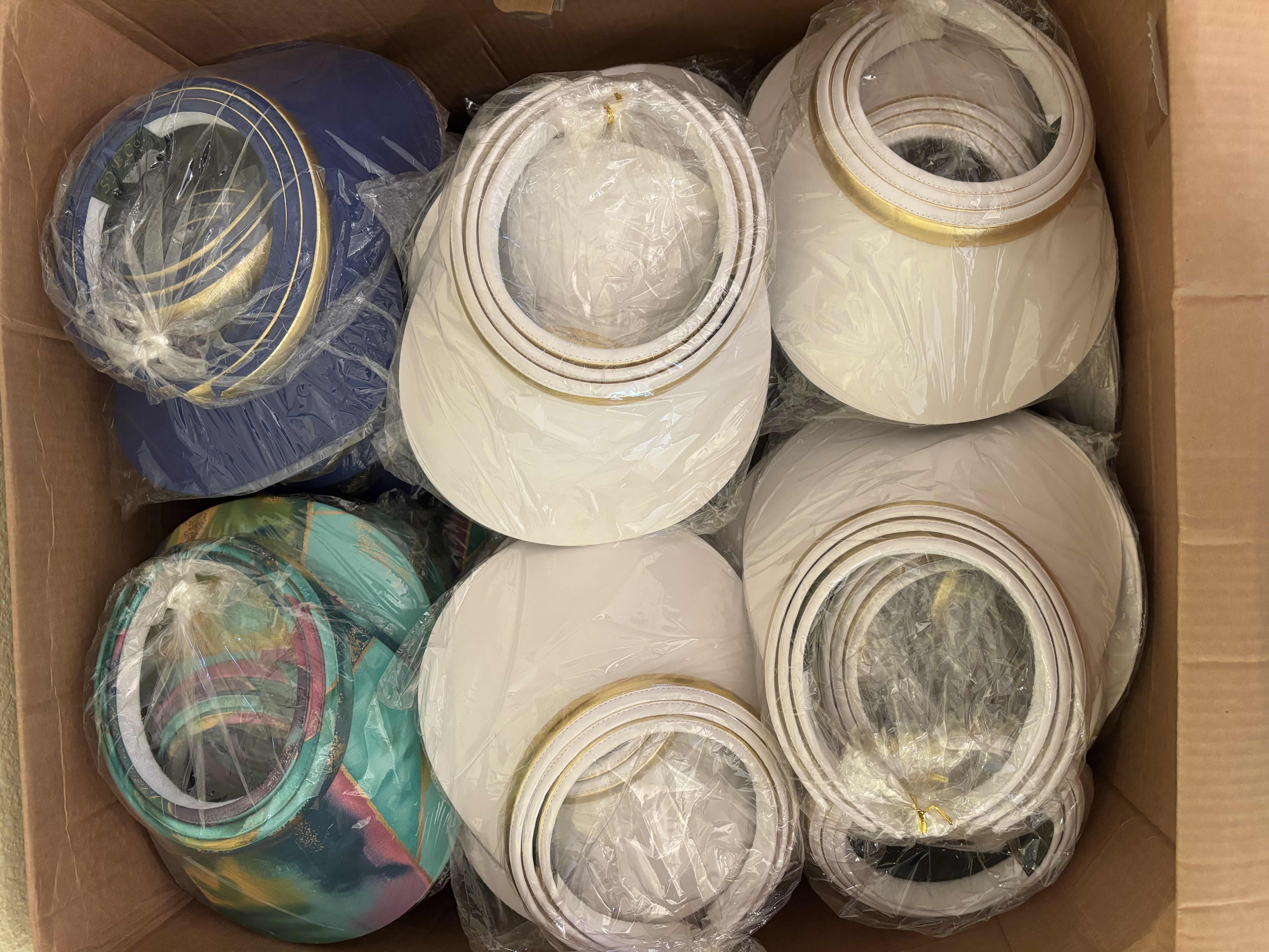 Photo 1 of BOX OF VISORS IN MULTIPLE COLORS & STYLES