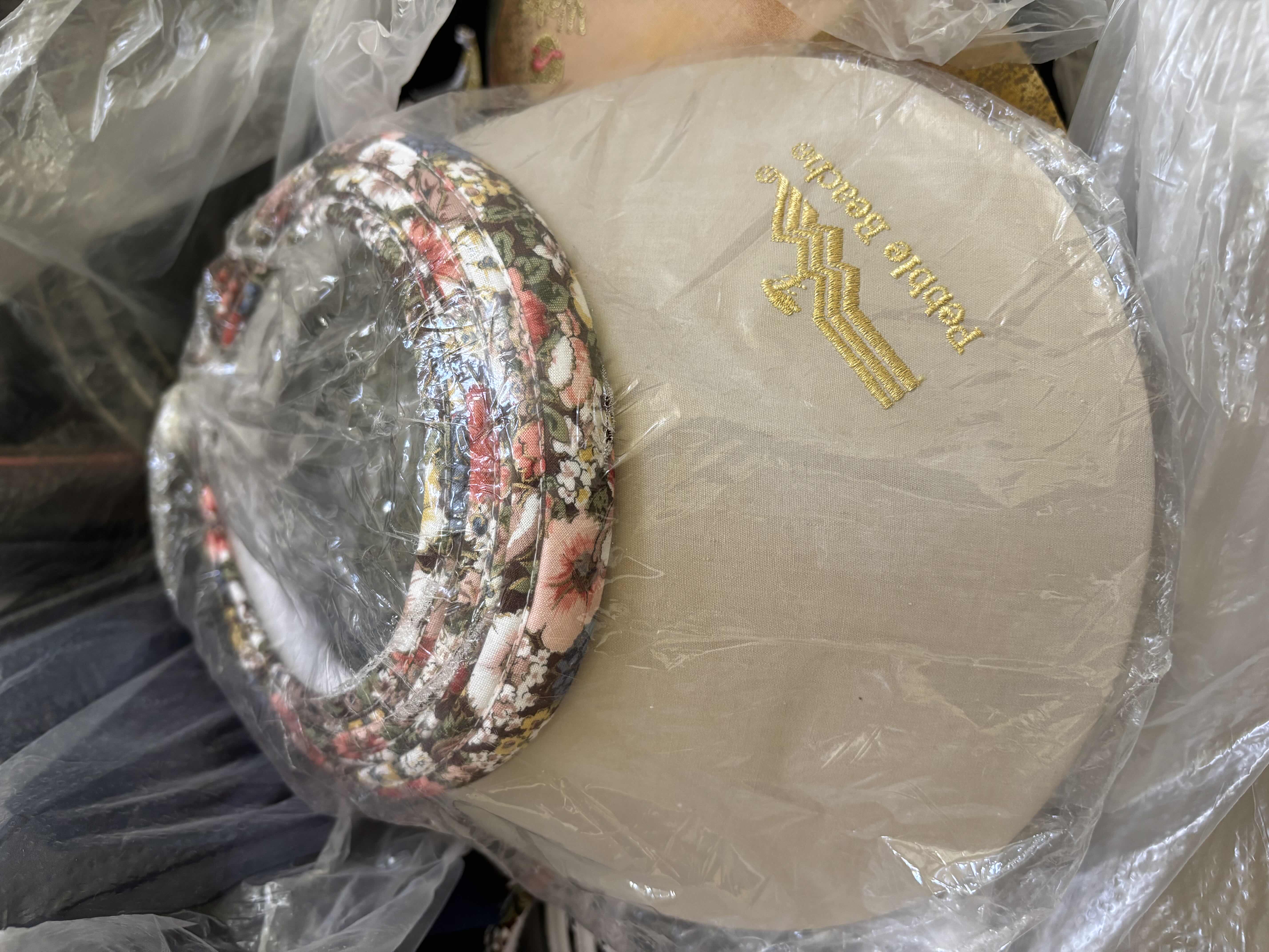 Photo 1 of LARGE BAG OF VISORS IN MULTIPLE COLORS & STYLES