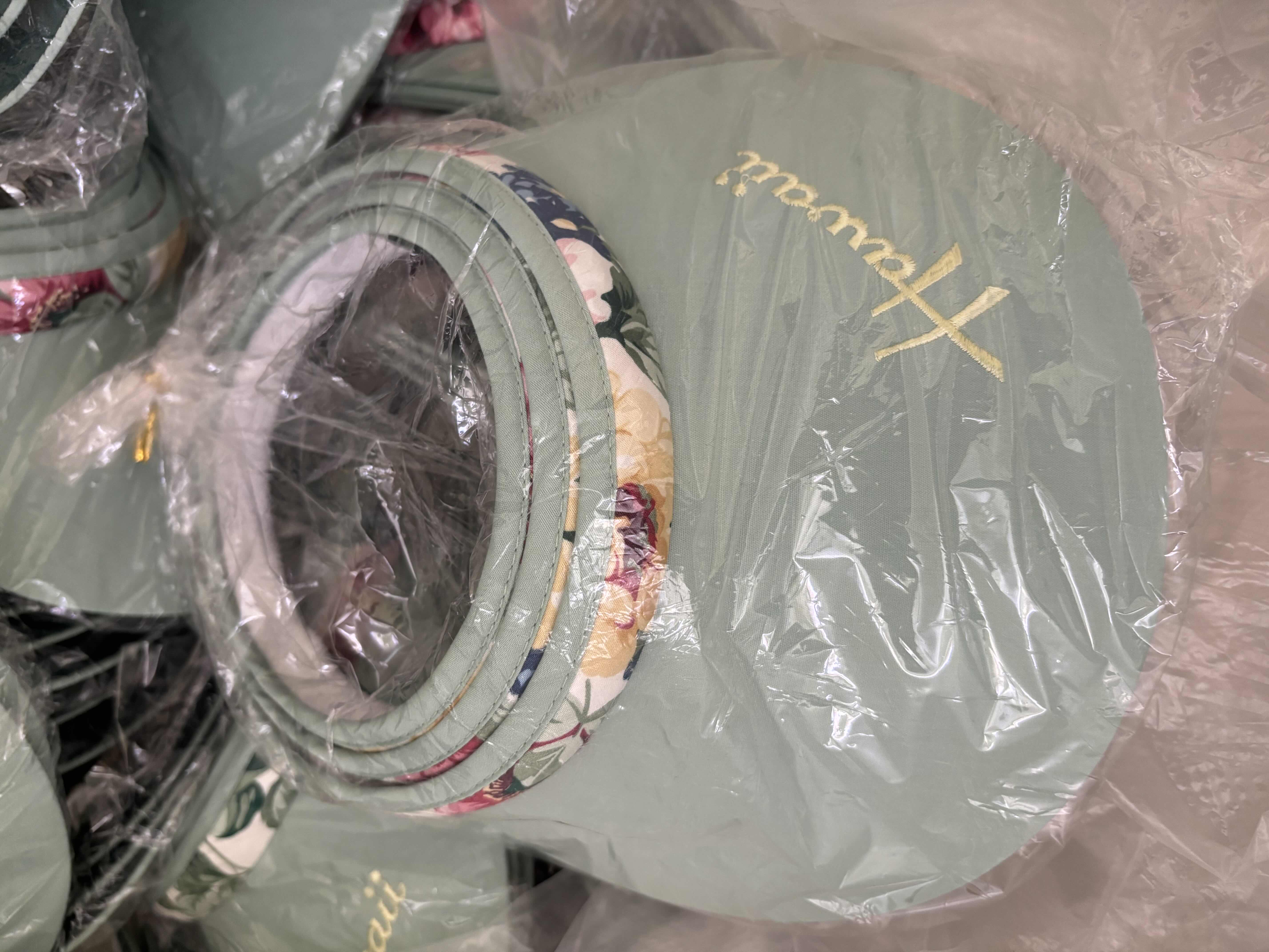 Photo 1 of LARGE BAG OF HAWAII VISORS