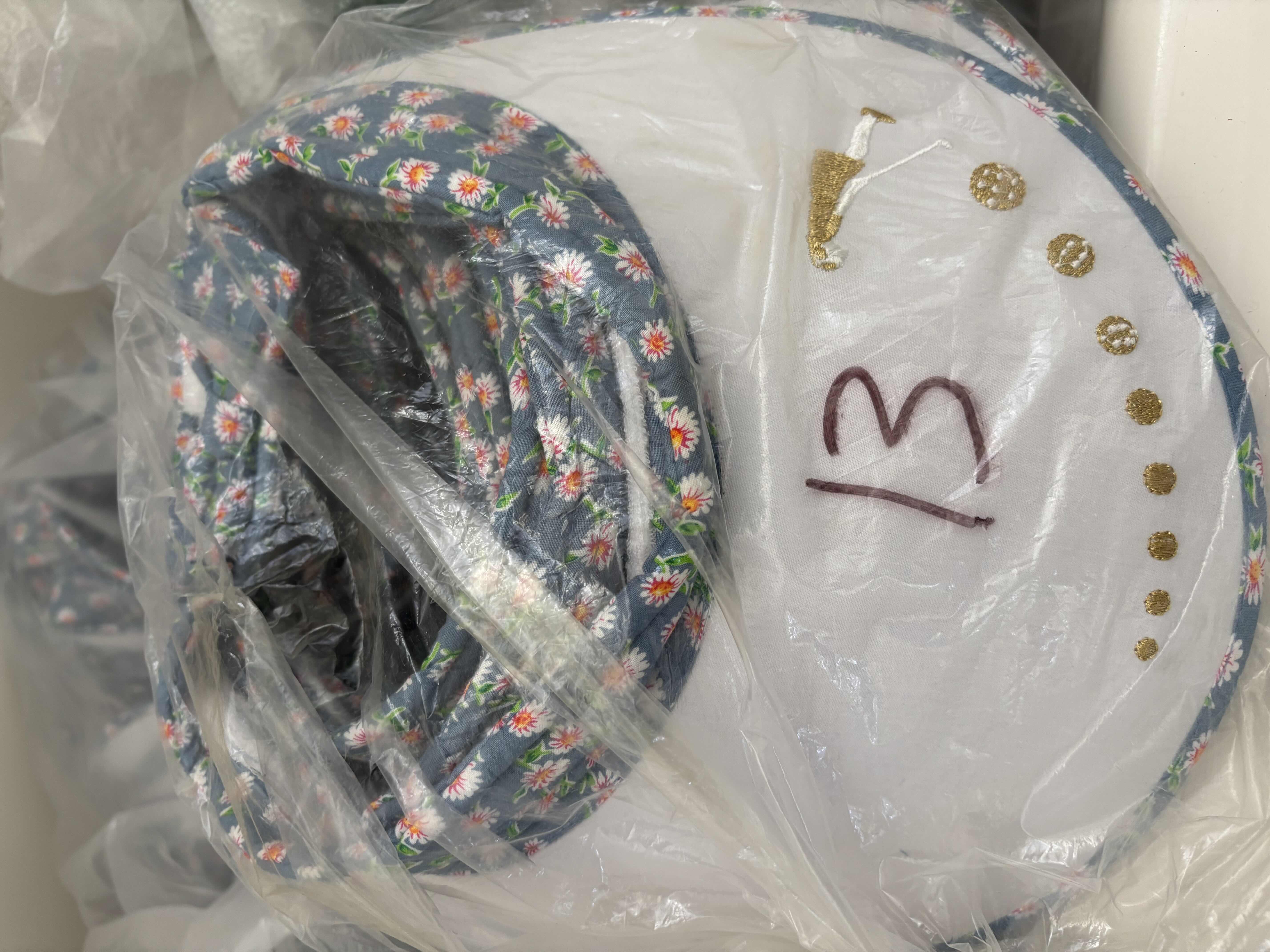 Photo 1 of LARGE BAGS OF VISORS IN MULTIPLE COLORS & STYLES