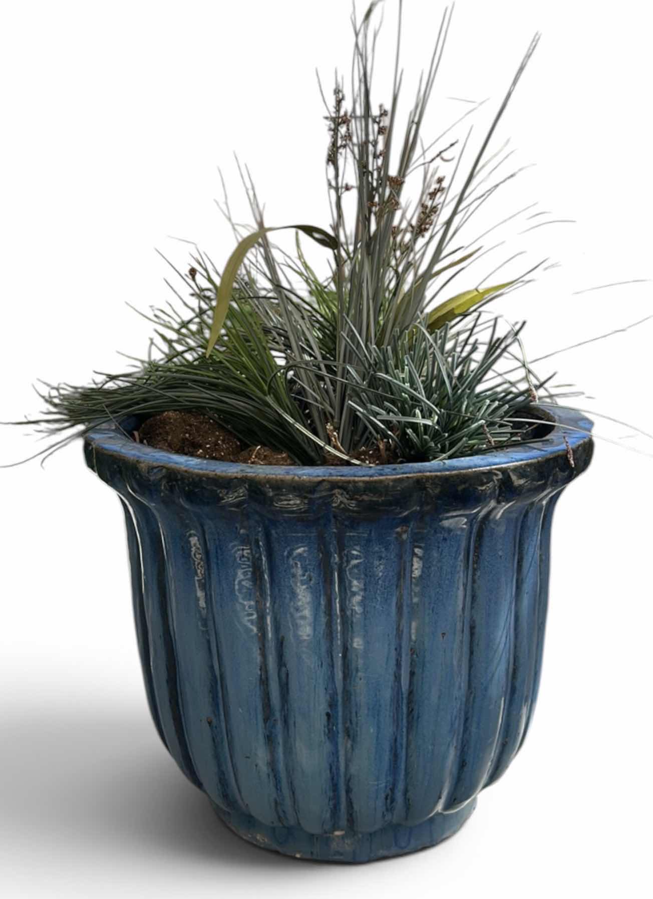 View 1 of BLUE FLUTED CERAMIC PLANTER 20 1/2” x H15 1/2 WITH FAUX GREENERY