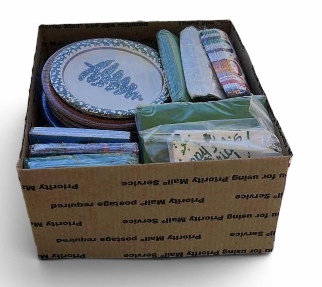 Photo 1 of BOX OF NEW DISPOSABLE PLATES AND NAPKINS