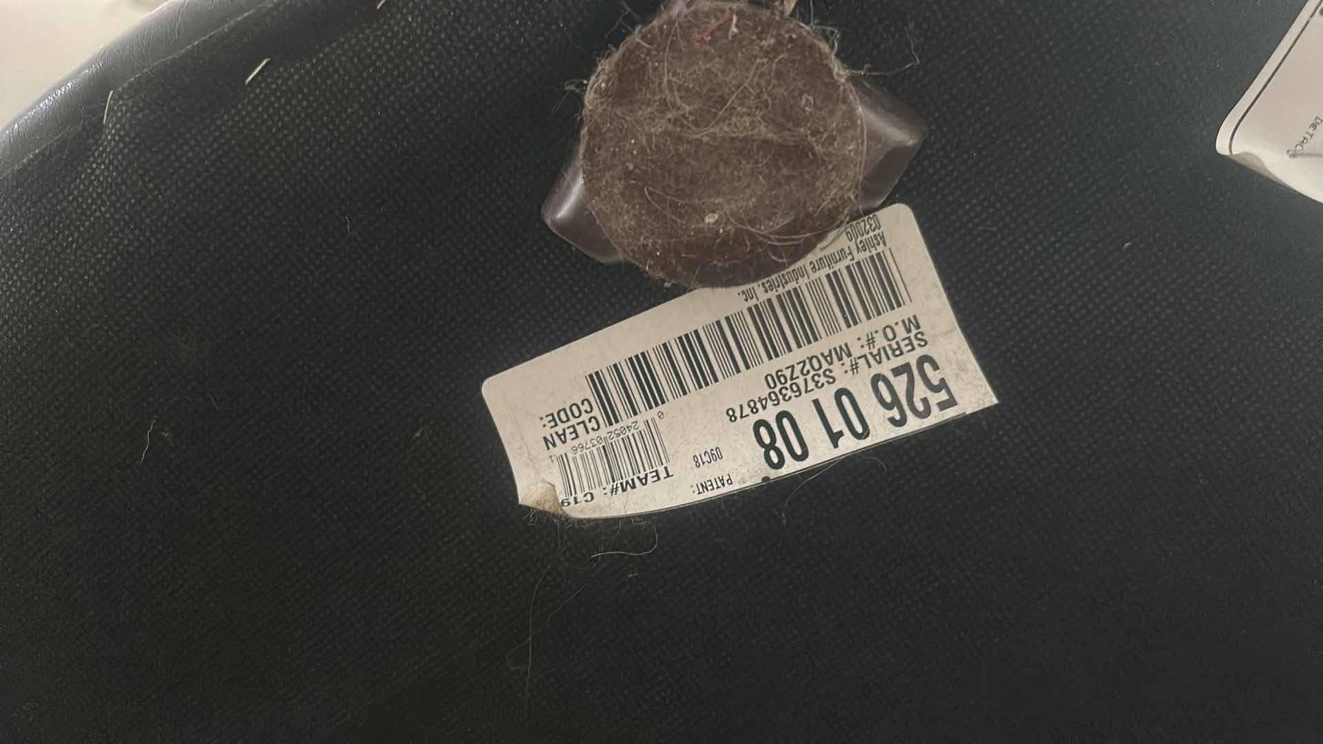 Photo 1 of ASHLEY FURNITURE ROUND IMITATION LEATHER OTTOMAN 38” x H19”