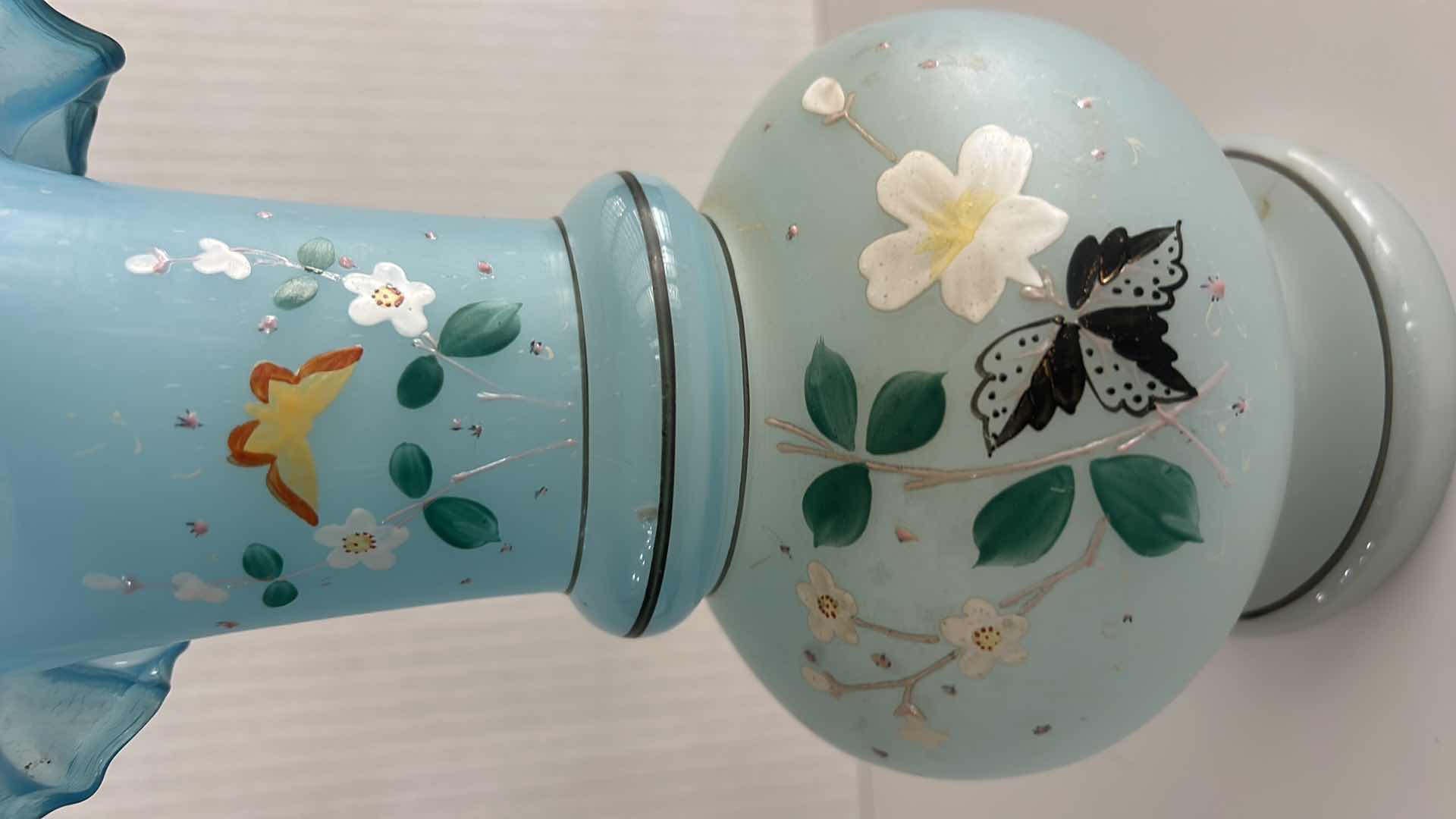 Photo 1 of VINTAGE BRISTOL GLASS VASE FEATURING A HAND-PAINTED BUTTERFLY & FLORAL ENAMEL DESIGN W A BLUE RUFFLED RIM H10.25