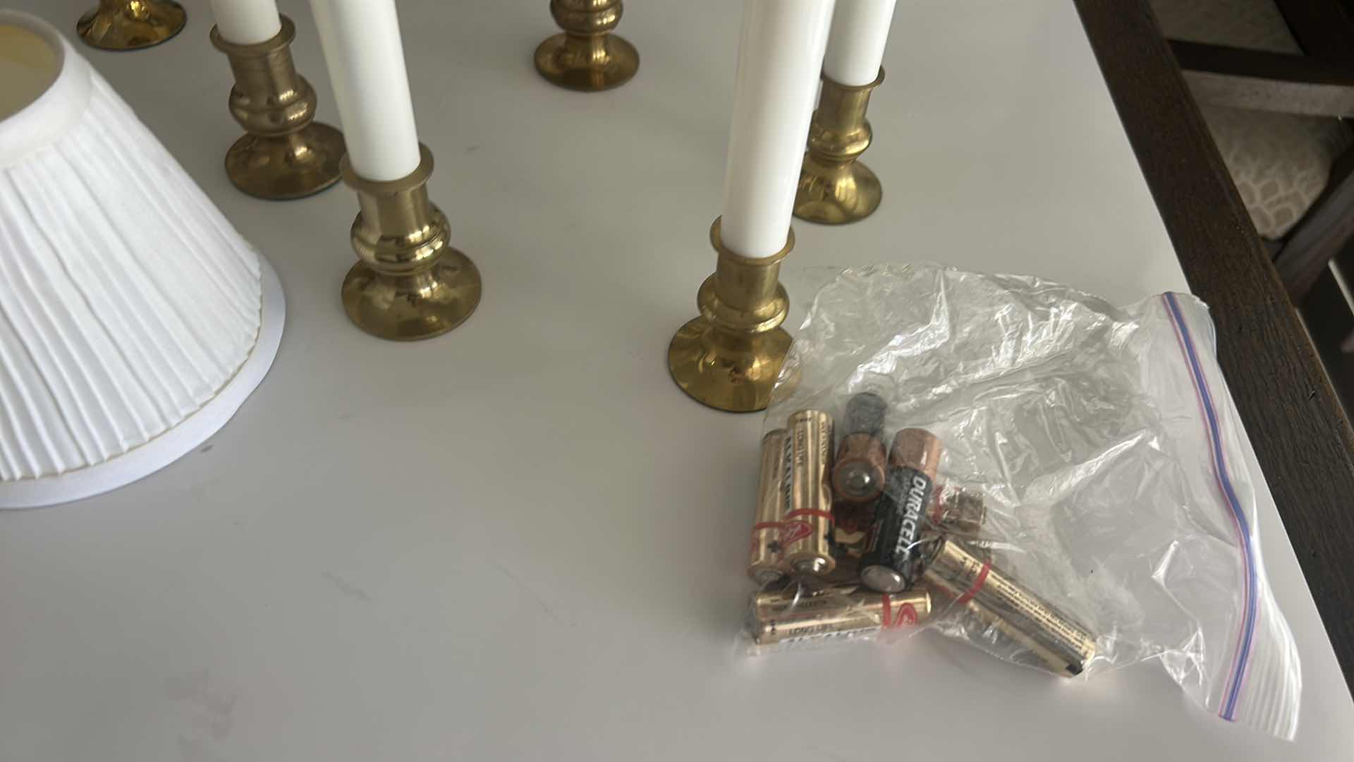 Photo 1 of BOX FULL OF BATTERY CANDLES, SMALL PLEATED SHADES FOR CANDLES, BULBS - BATTERIES