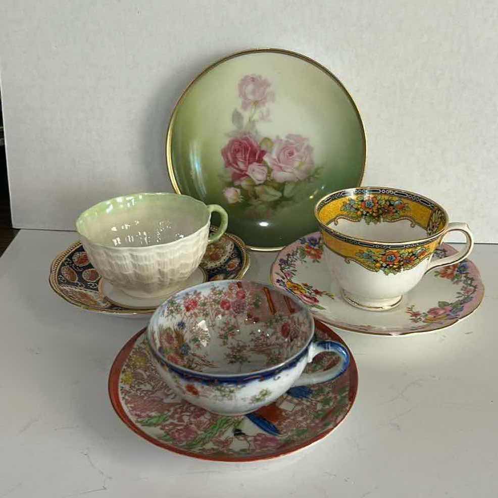 Photo 1 of MISMATCHED TEA, CUPS, AND SAUCERS