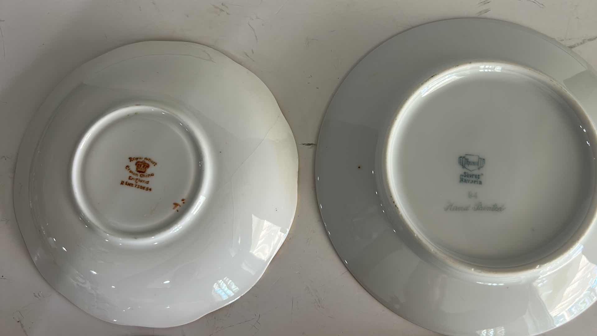 Photo 1 of MISMATCHED TEA, CUPS, AND SAUCERS