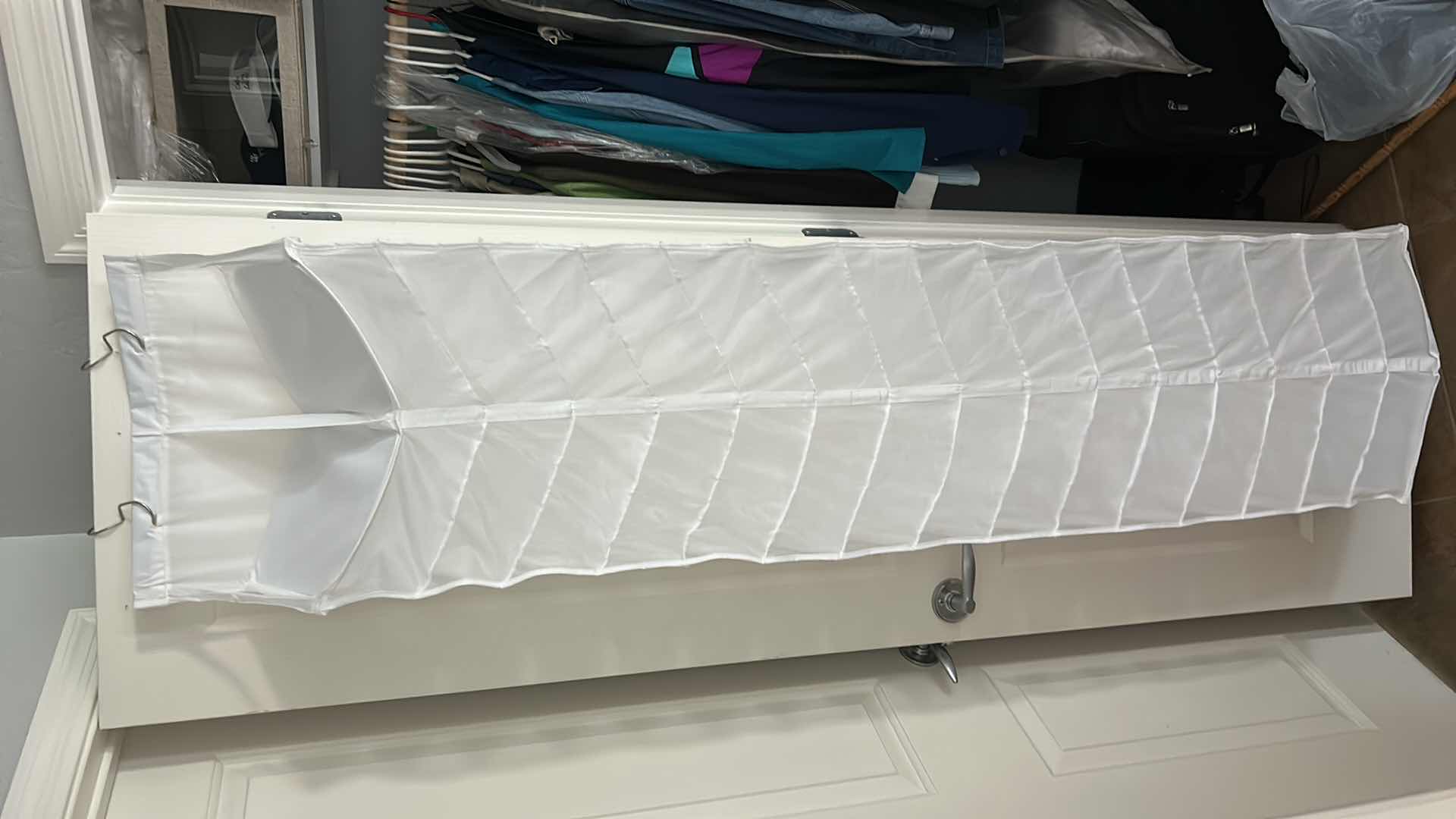 Photo 1 of OVER THE DOOR STORAGE RACK