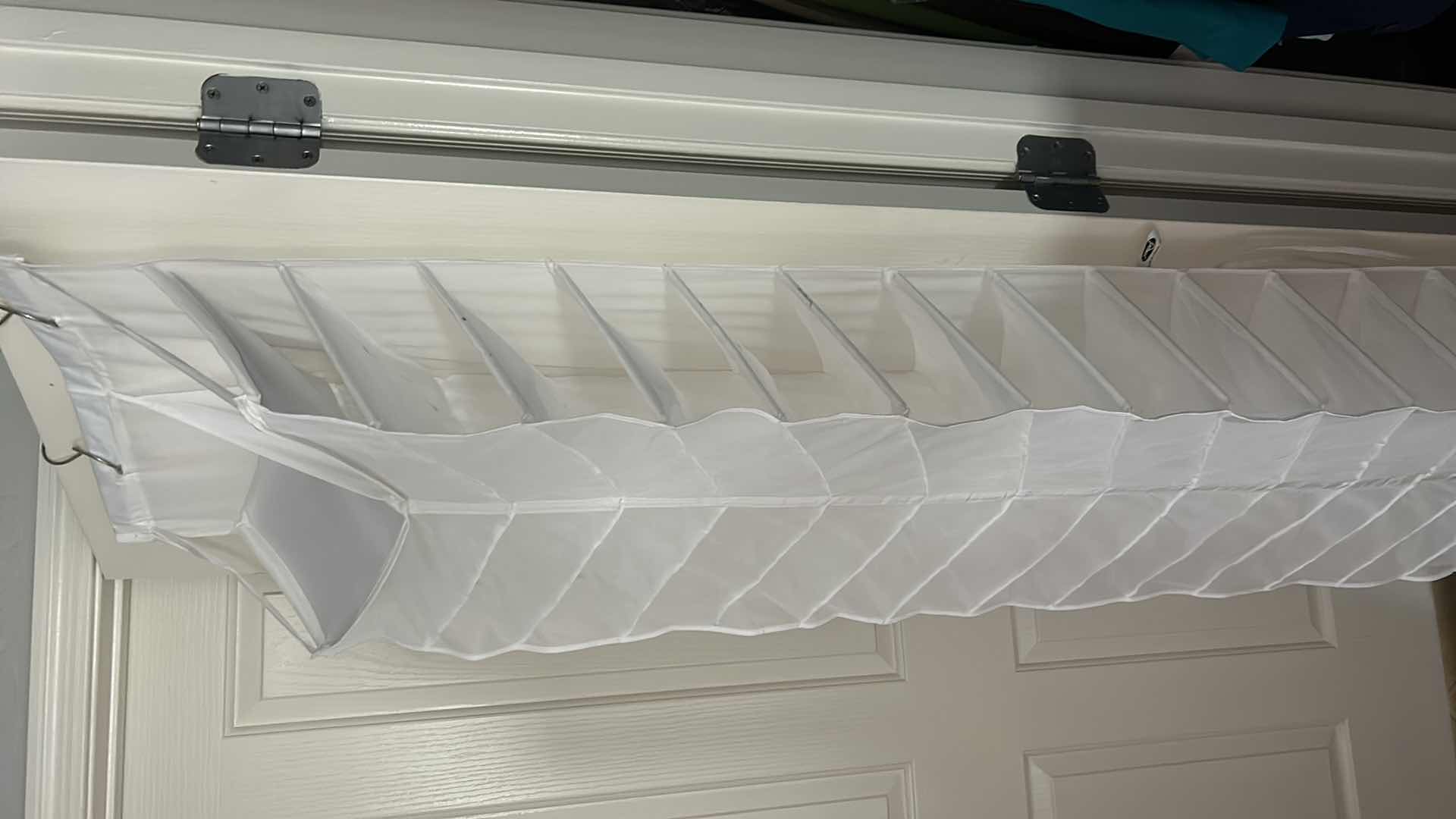 Photo 1 of OVER THE DOOR STORAGE RACK