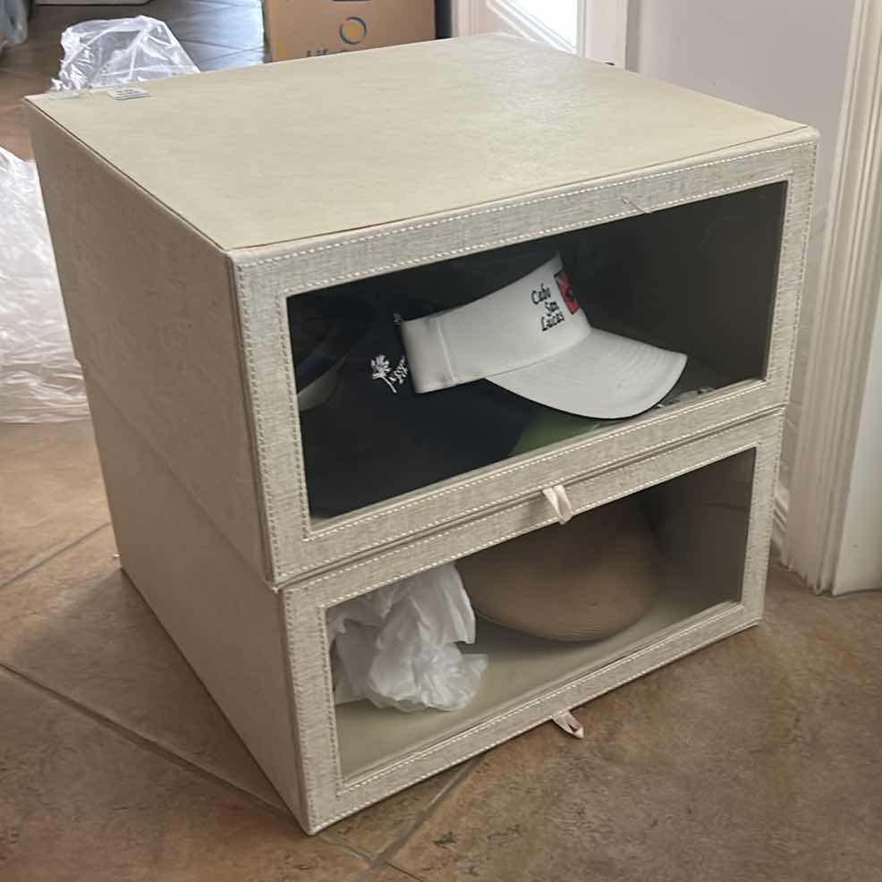 Photo 1 of TWO STORAGE BOXES WITH HATS $80