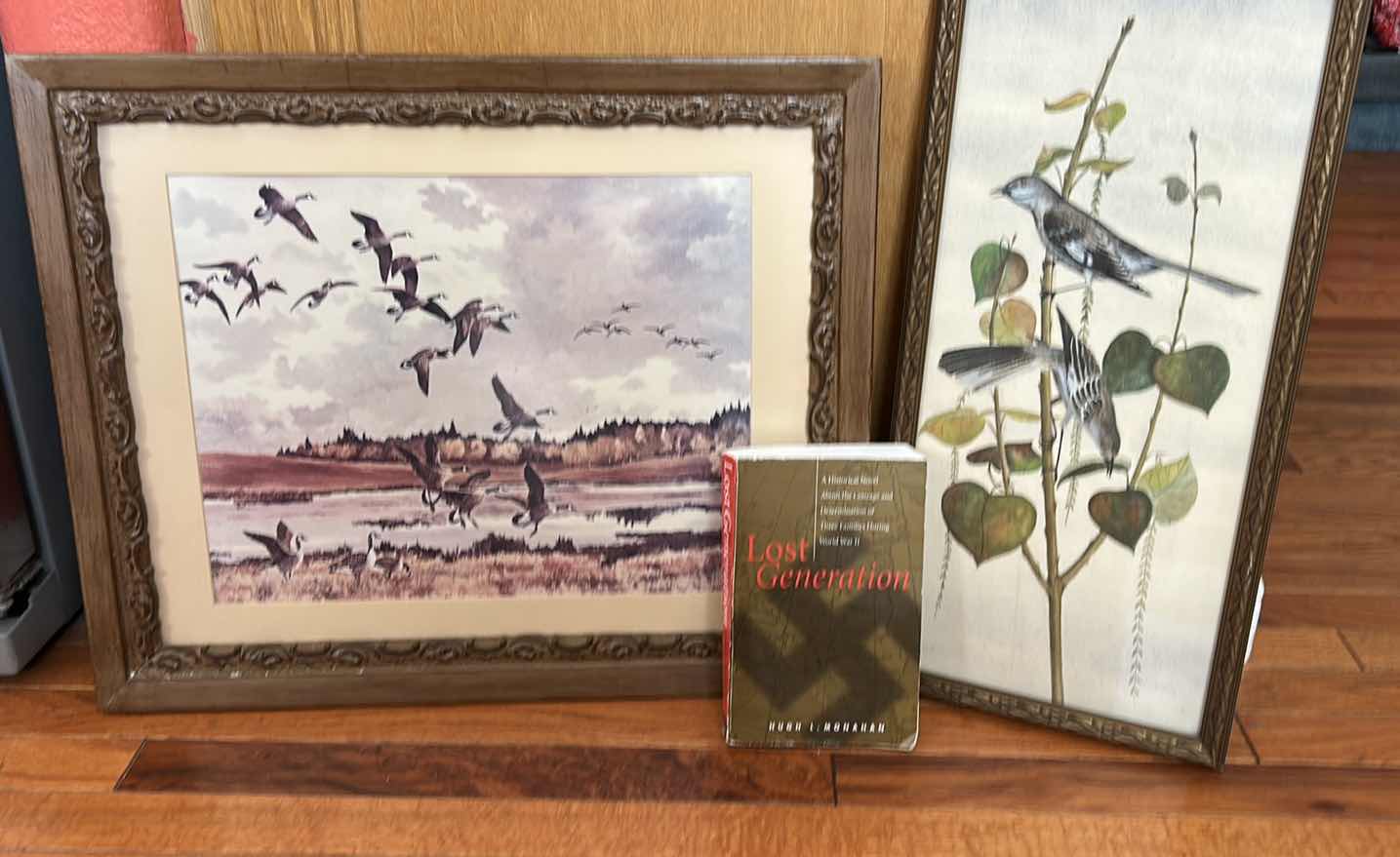 Photo 1 of TWO FRAMED ARTWORK PIECES ON CANVAS SIGNED BY ARTISTS DON DANBY & HUGH CECIL CHARLES MONOHAN (1914–1970) ALONG WITH THE BOOK “LOST GENERATION” BY JOHN R DONOVAN,