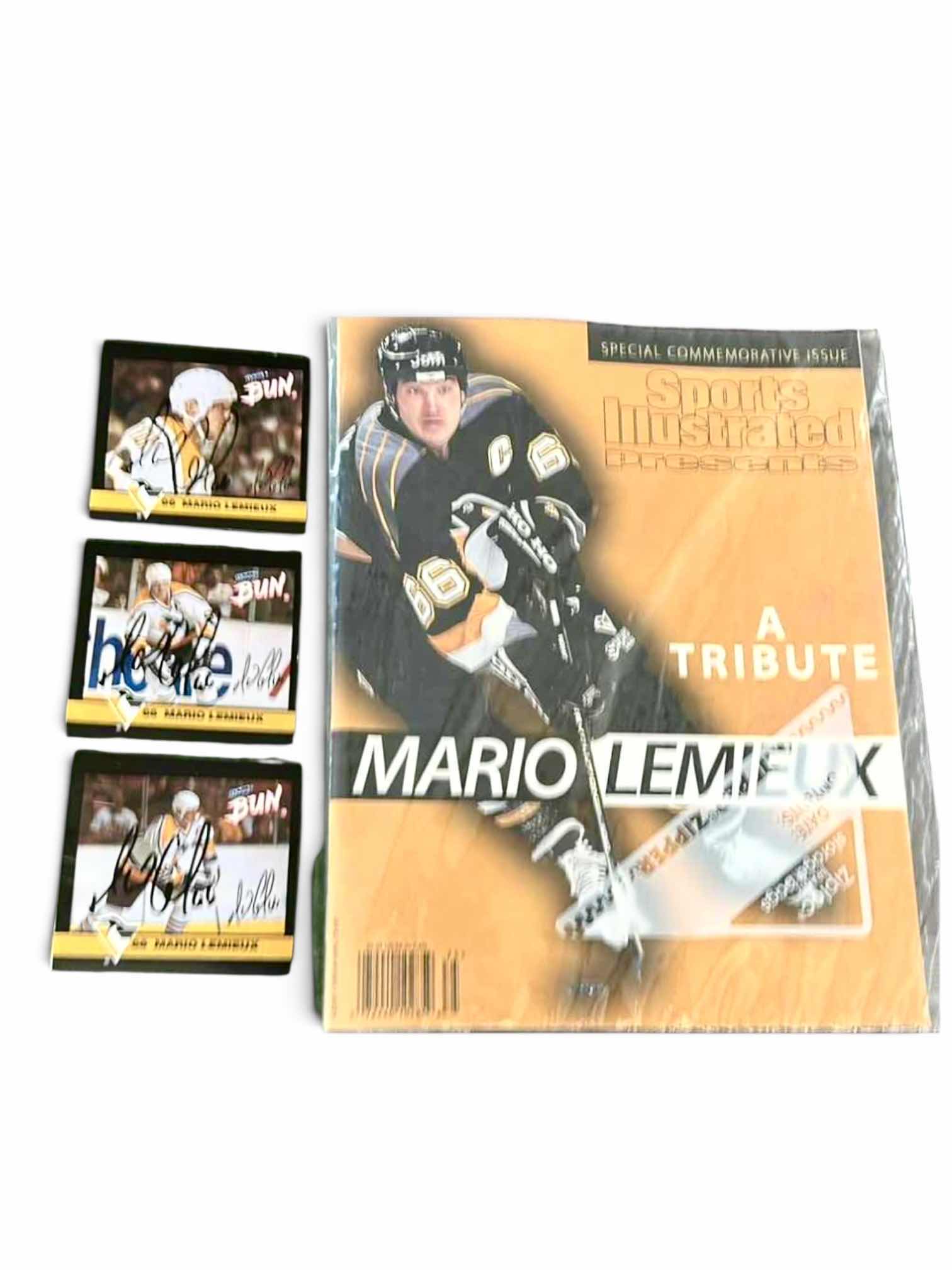 Photo 1 of COLLECTION OF MARIO LEMIEUX MEMORABILIA, SPECIFICALLY FEATURING A 1997 SPORTS ILLUSTRATED SPECIAL COMMEMORATIVE ISSUE AND ACCOMPANYING TRADING CARDS