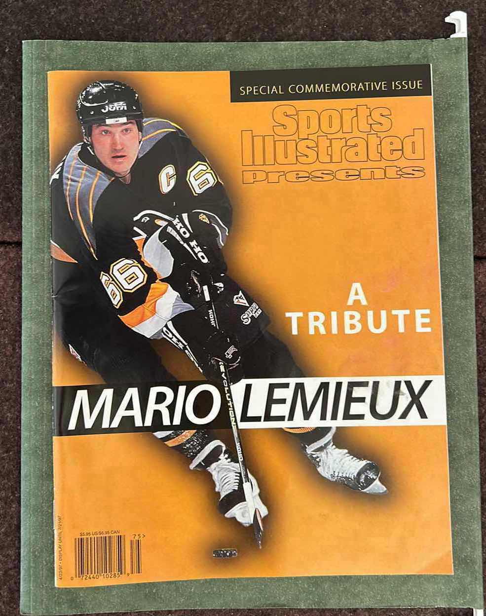 Photo 1 of COLLECTION OF MARIO LEMIEUX MEMORABILIA, SPECIFICALLY FEATURING A 1997 SPORTS ILLUSTRATED SPECIAL COMMEMORATIVE ISSUE AND ACCOMPANYING TRADING CARDS