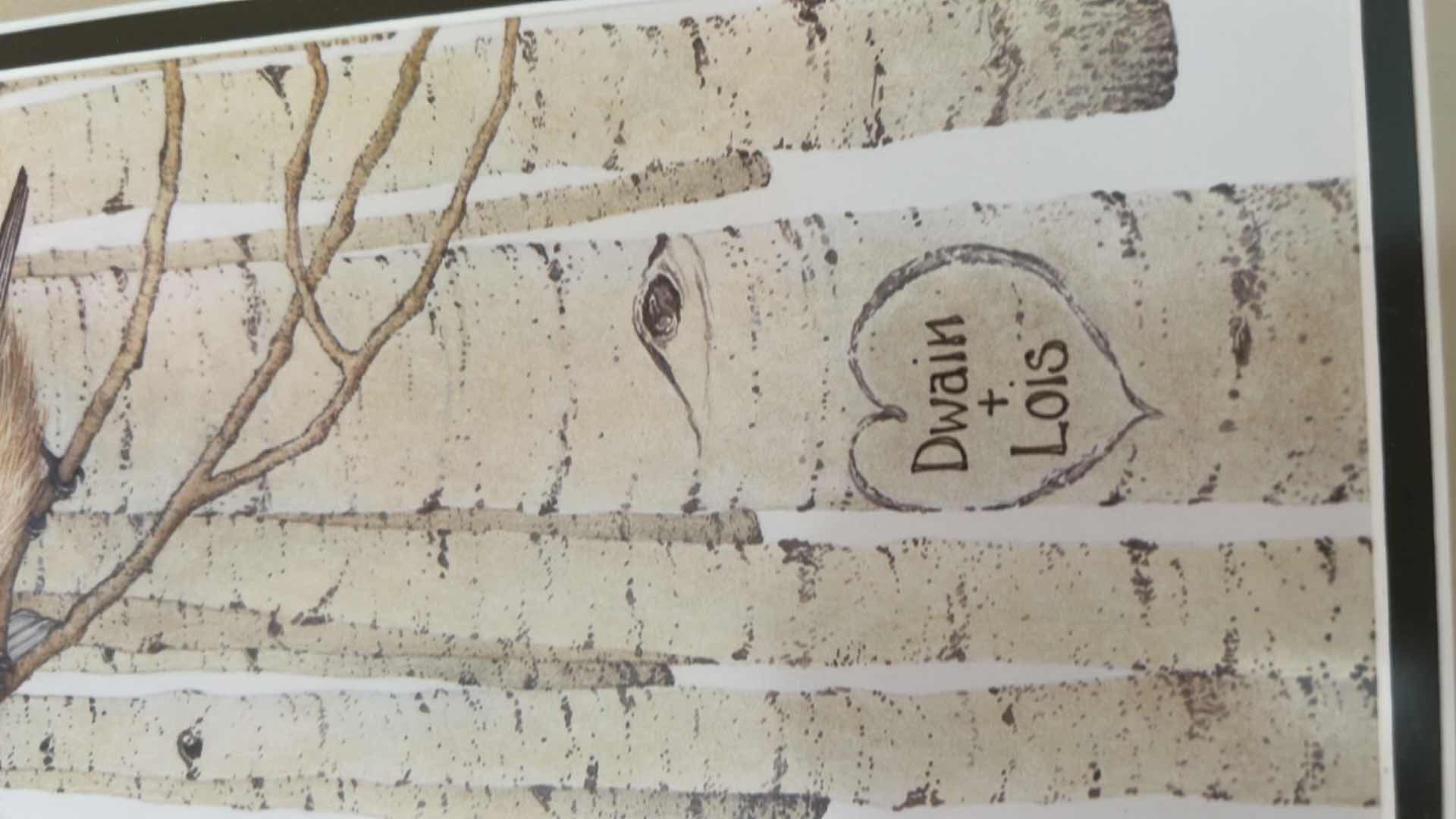 Photo 1 of FRAMED ARTWORK TITLED “LOVE BIRDS” DESIGNED BY SCOTT KENNEDY FEATURING A PAIR OF CHICKADEES ON BIRCH TREES AND A PERSONALIZED CARVING 12” x H18 1/2”