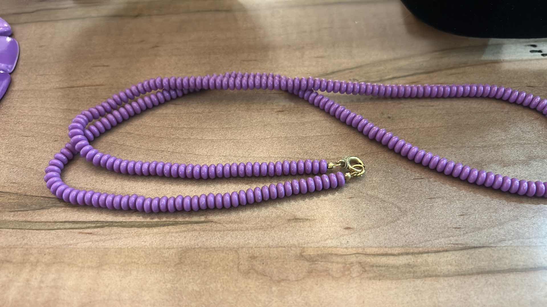 Photo 1 of THREE VINTAGE PURPLE NECKLACES