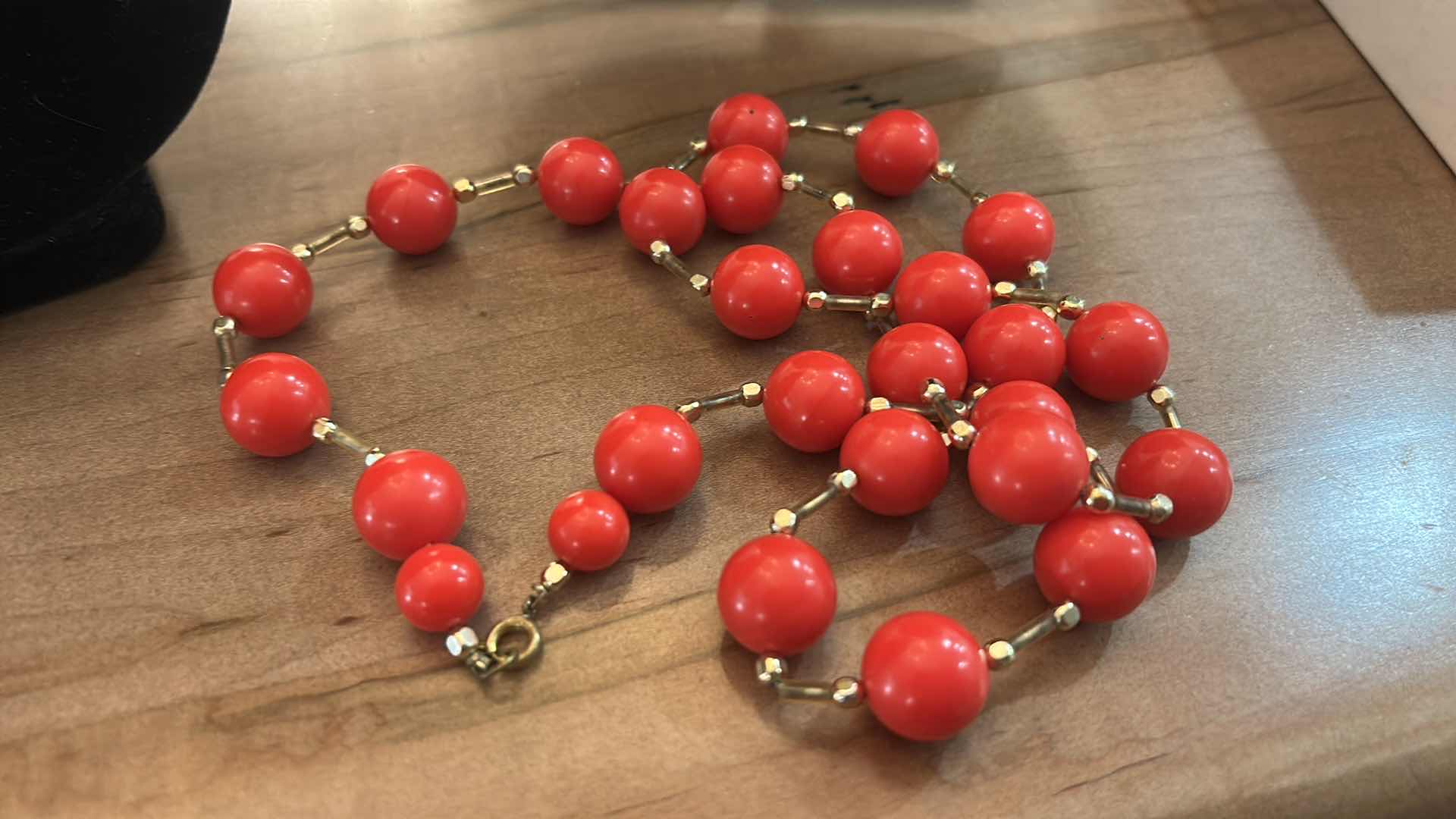Photo 1 of THREE VINTAGE ORANGE TONE NECKLACES