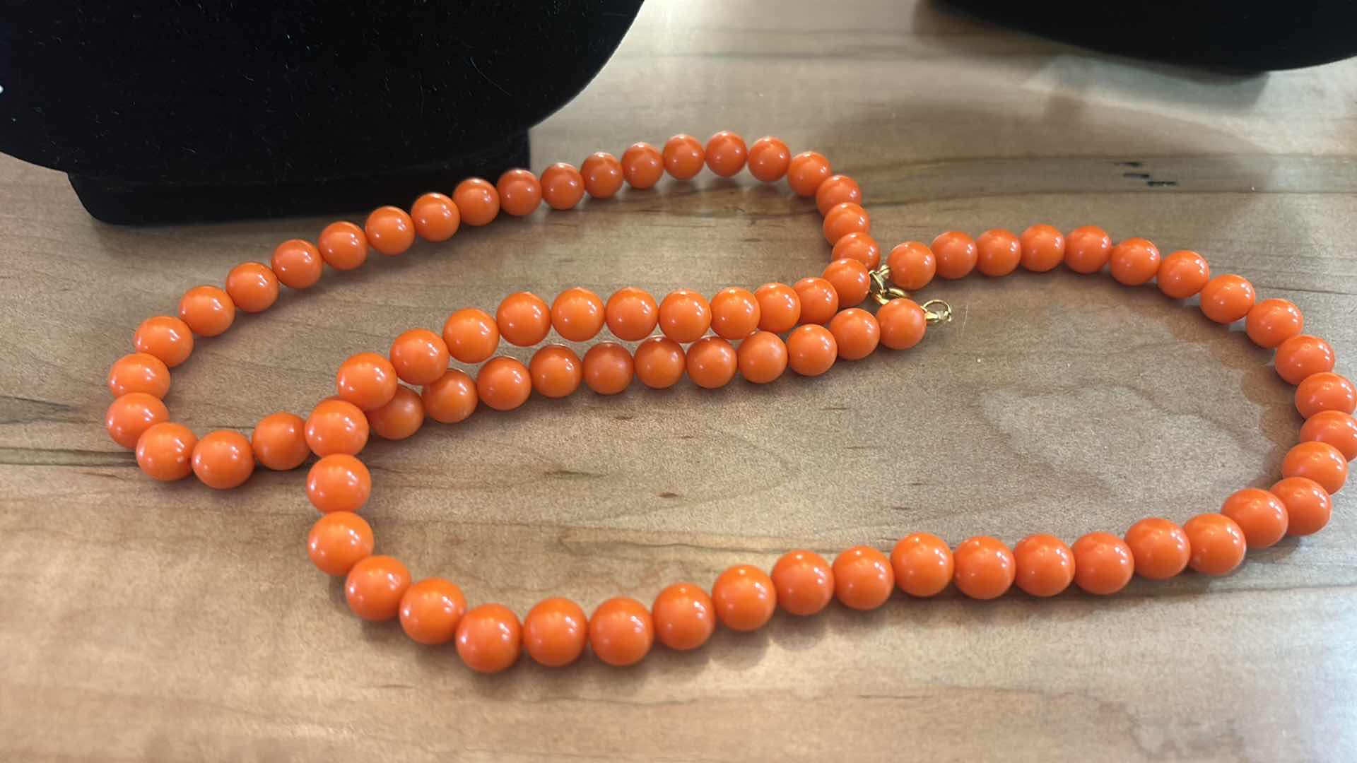 Photo 1 of THREE VINTAGE ORANGE TONE NECKLACES