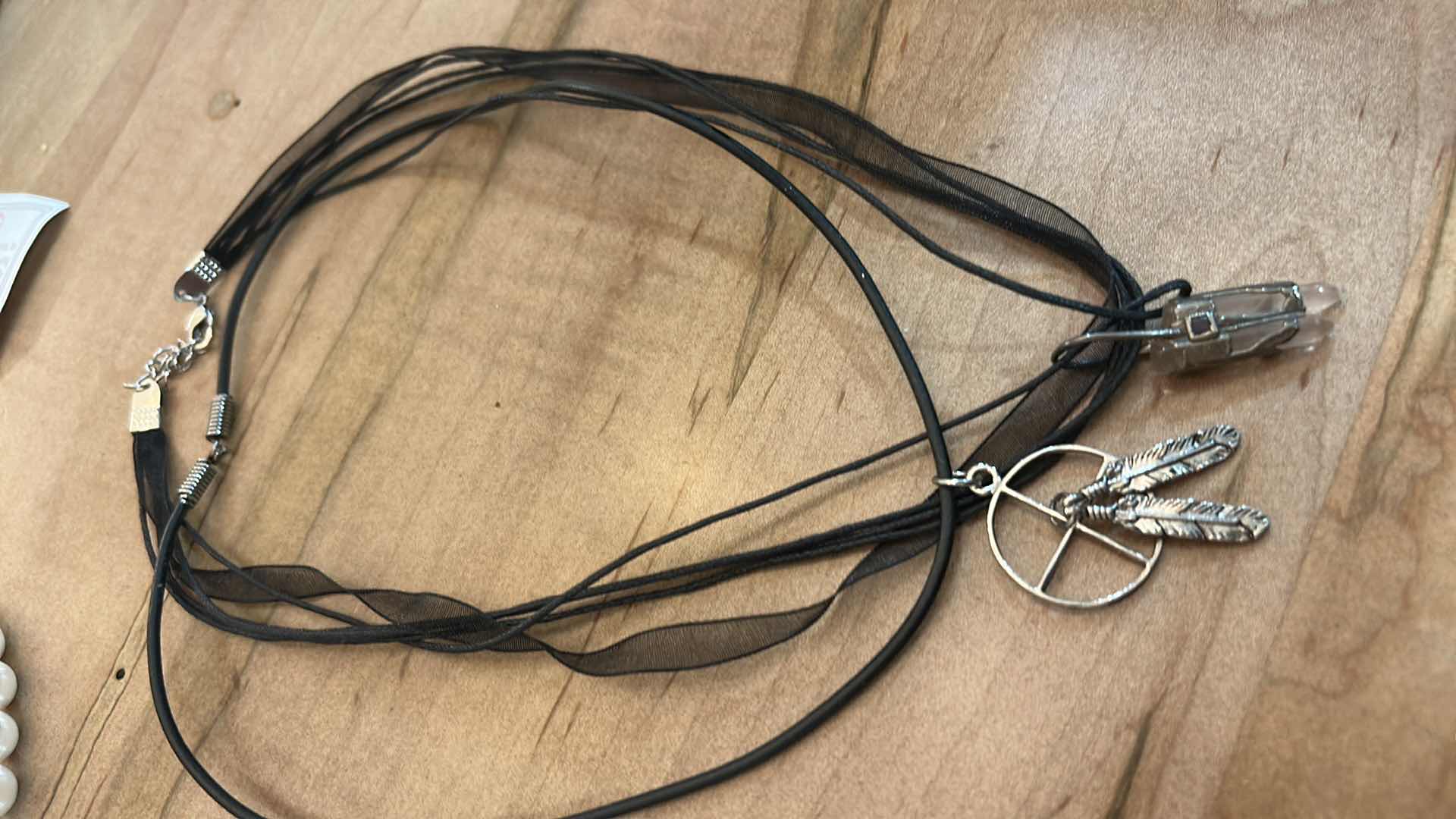 Photo 1 of THREE NECKLACES AND THREE BRACELETS