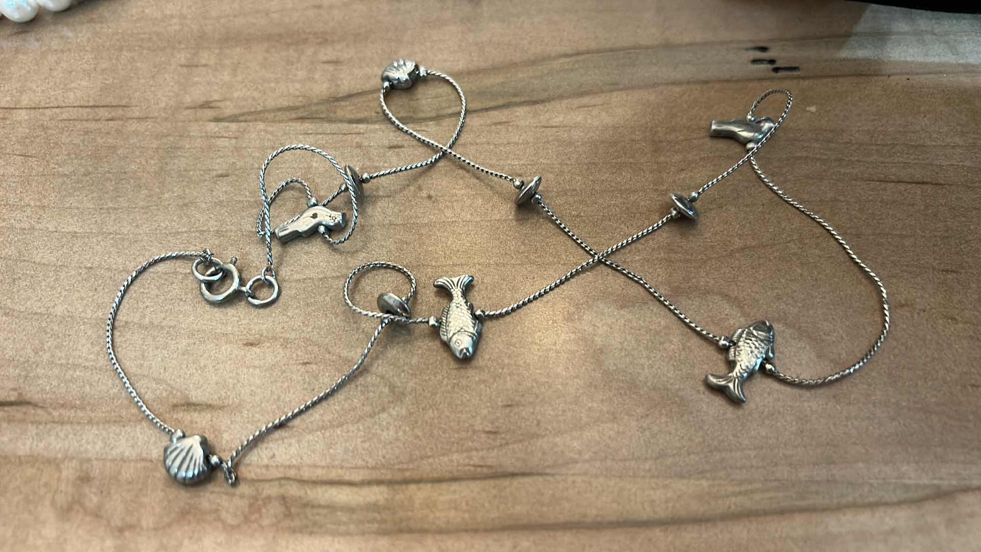 Photo 1 of FOUR NECKLACES