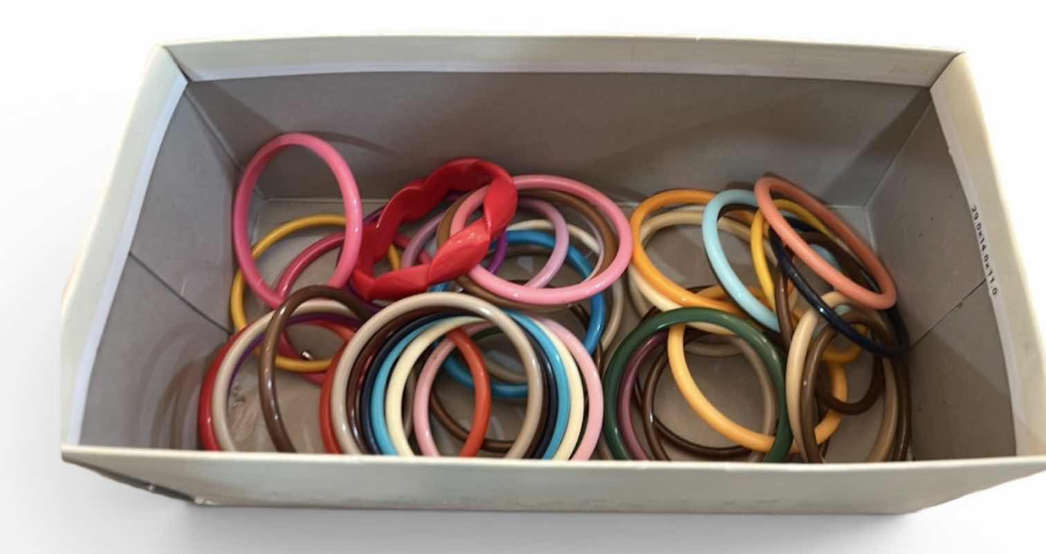 Photo 1 of BOX OF MULTICOLORED BRACELETS