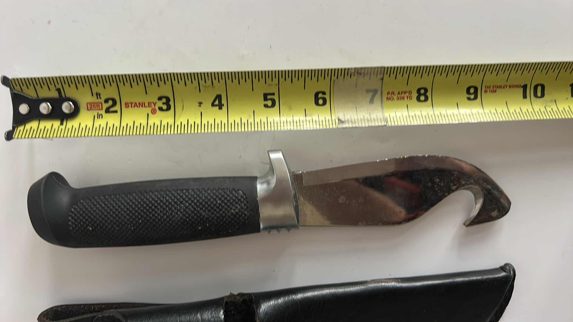 Photo 1 of RAPALA FIXED BLADE KNIFE.