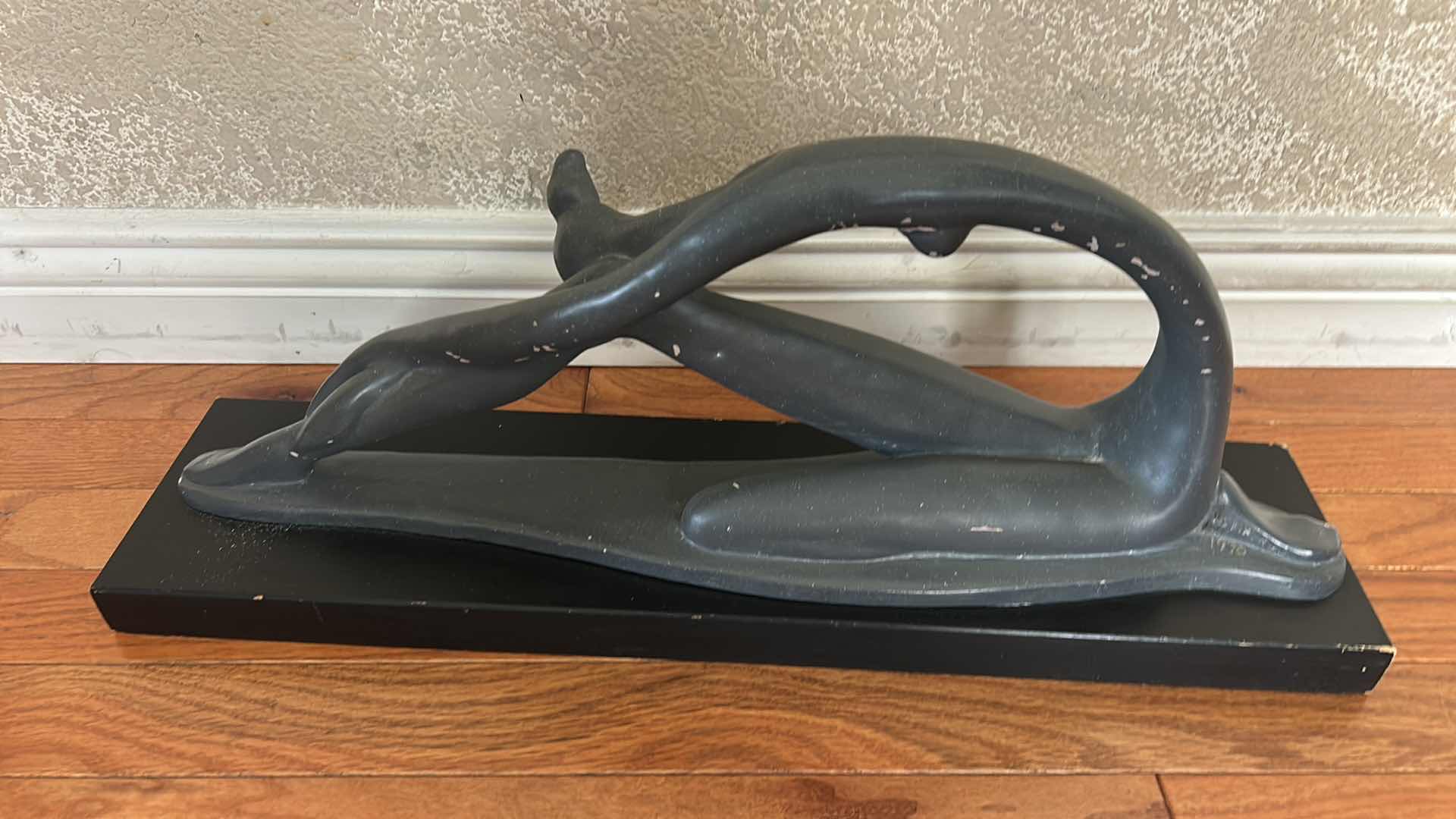 Photo 1 of VINTAGE 1970’S “STRETCHING DANCER”, ABSTRACT SCULPTURE BY AUSTIN PRODUCTIONS INC. DESIGNED BY ARTIST CLARA SEVER CRAFTED FROM PLASTER WITH A MATTE BLACK FINISH, MOUNTED ON A WOOD BASE . 23” x 5 1/2“ x H8“
