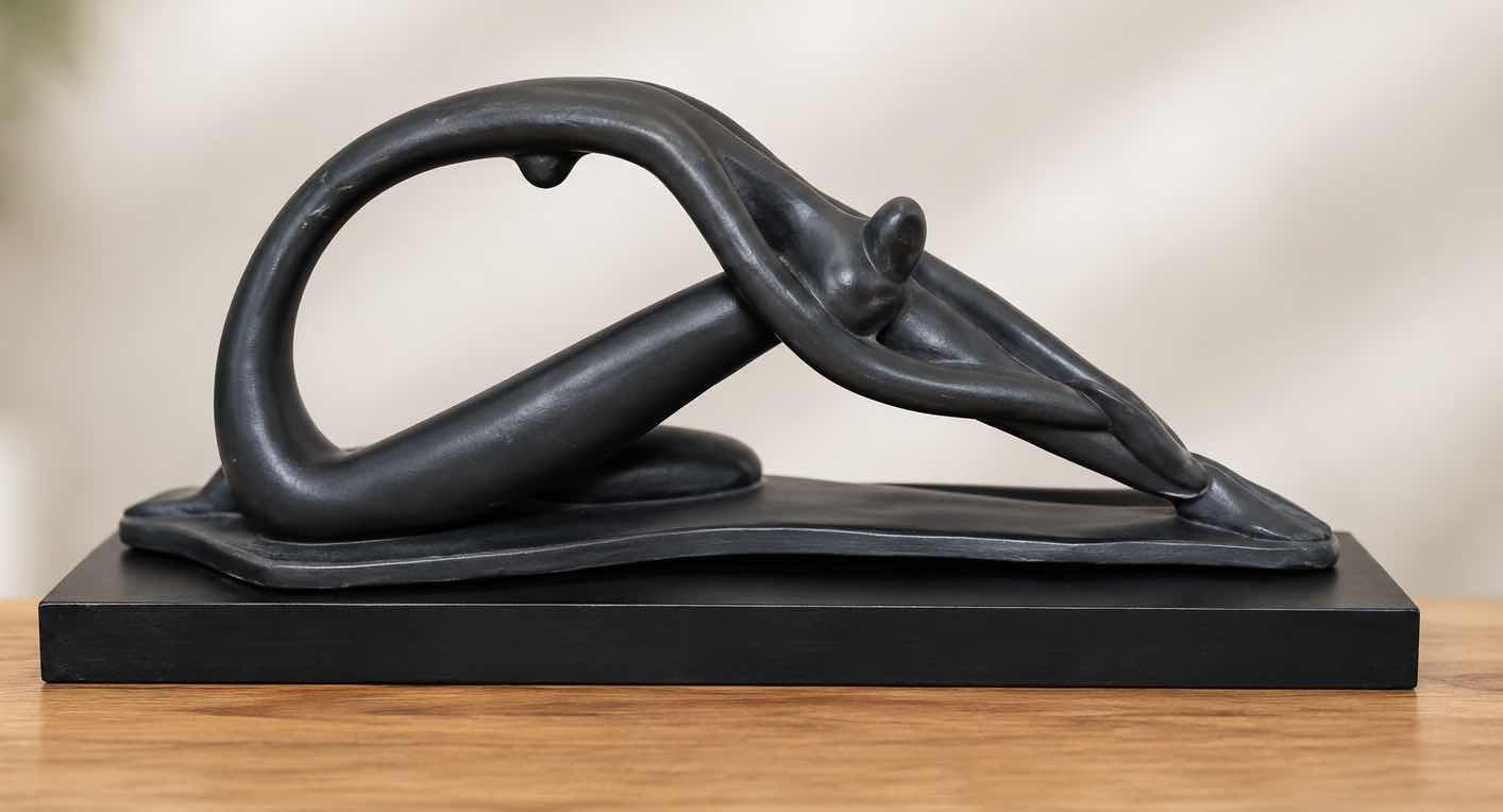 Photo 1 of VINTAGE 1970’S “STRETCHING DANCER”, ABSTRACT SCULPTURE BY AUSTIN PRODUCTIONS INC. DESIGNED BY ARTIST CLARA SEVER CRAFTED FROM PLASTER WITH A MATTE BLACK FINISH, MOUNTED ON A WOOD BASE . 23” x 5 1/2“ x H8“