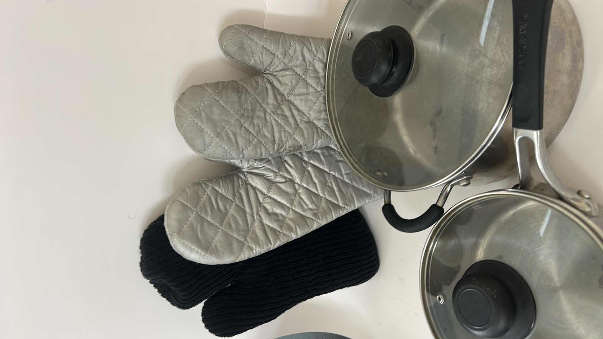 Photo 1 of FARBERWARE POTS AND PANS WITH LIDS AND OVEN MITTS