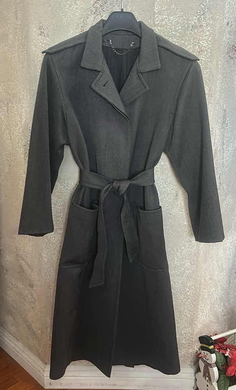 Photo 1 of WOMEN’S TRENCHCOAT ESTIMATED SIZE MEDIUM