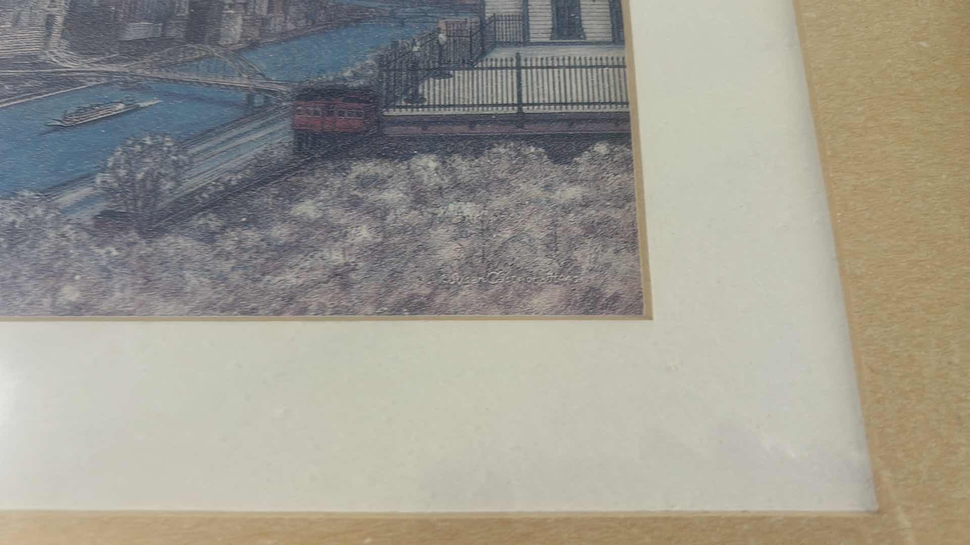 Photo 1 of FRAMED PRINT ARTWORK BY REGIONAL ARTIST, NEVIN ROBINSON TITLED “PITTSBURGH
FROM MOUNT WASHINGTON” 15 1/2 x H12 1/2