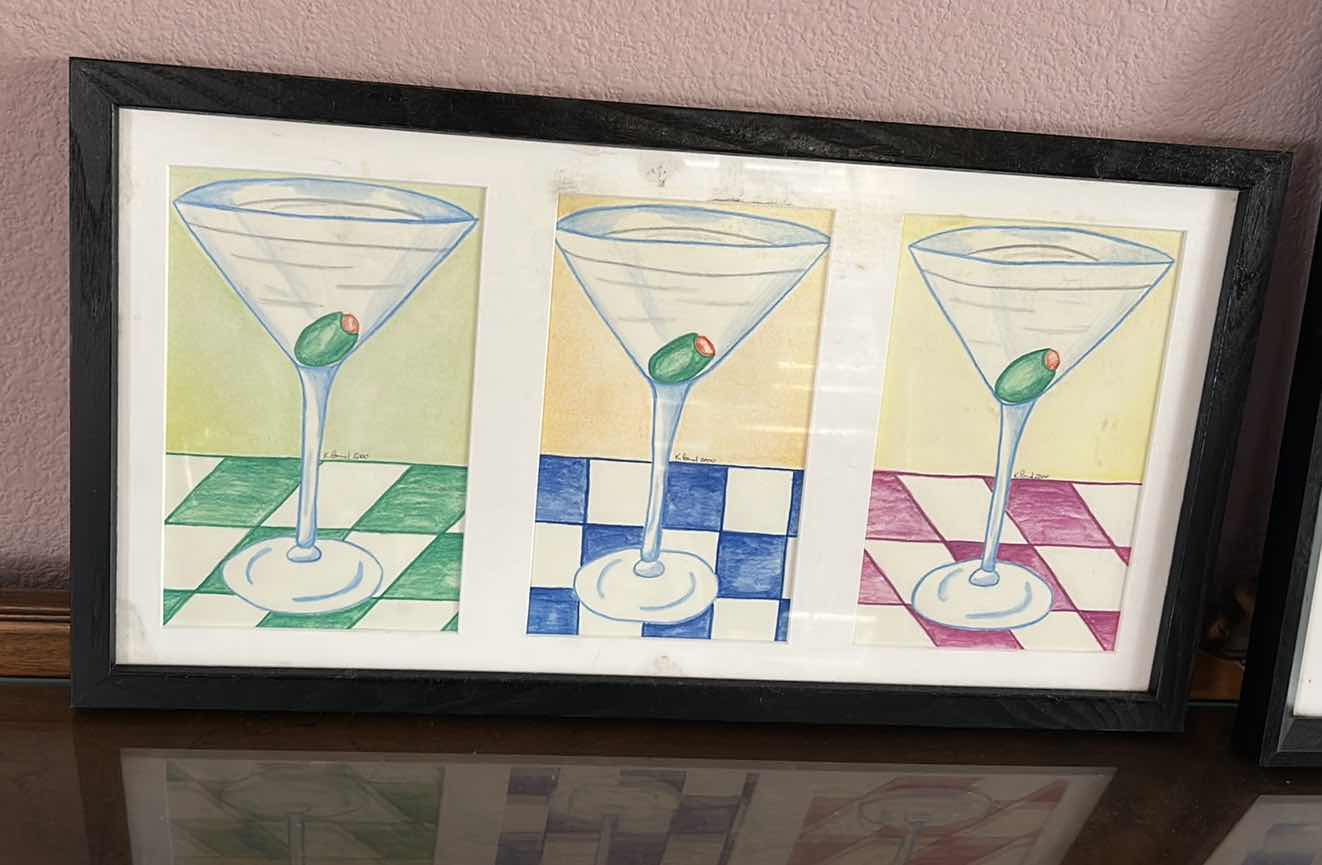 Photo 1 of FRAMED SIGNED ARTWORK FEATURING A WHIMSICAL ILLUSTRATION OF 3 CLASSIC MARTINI GLASSES WITH GREEN PIMENTO STUFFED OLIVES 21” x 11 1/4”