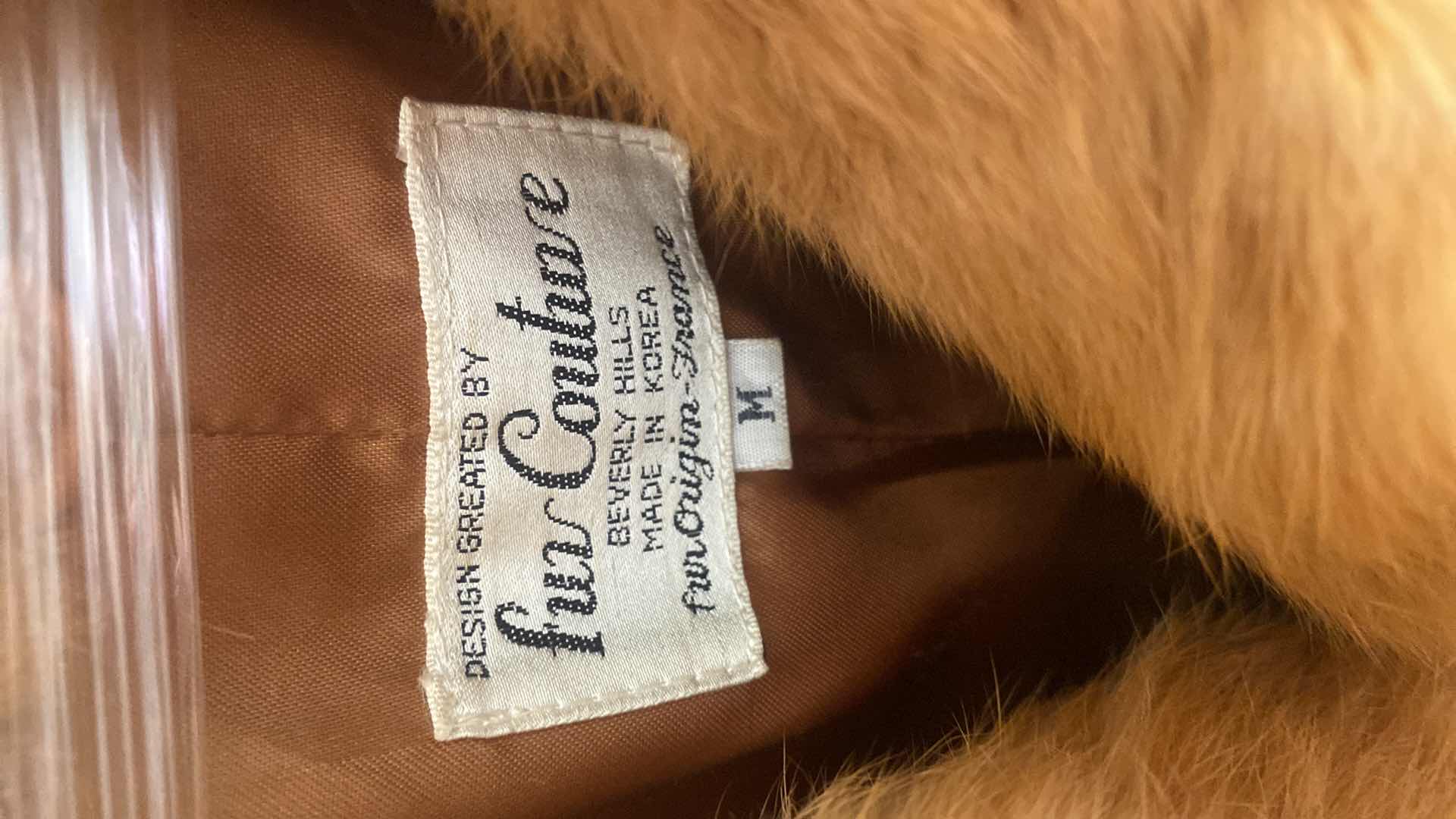 Photo 1 of WOMENS RED FUR COAT SIZE MEDIUM
