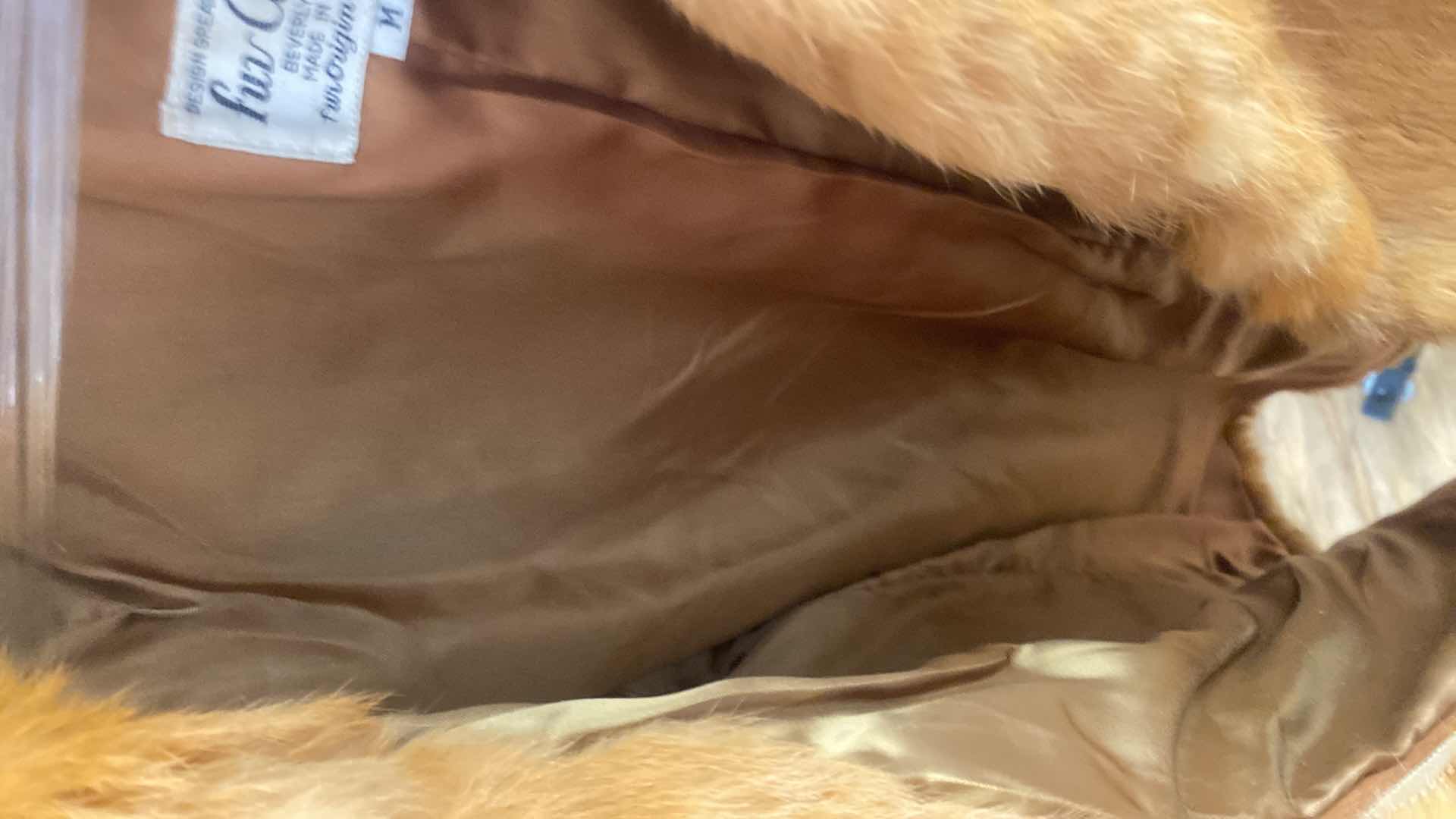 Photo 1 of WOMENS RED FUR COAT SIZE MEDIUM