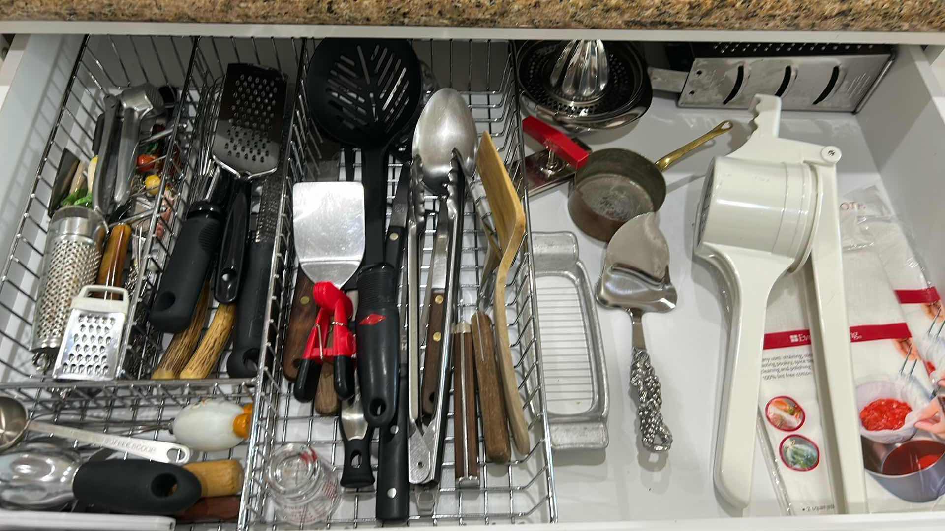 Photo 1 of CONTENTS OF DRAWER COOKING UTENSILS