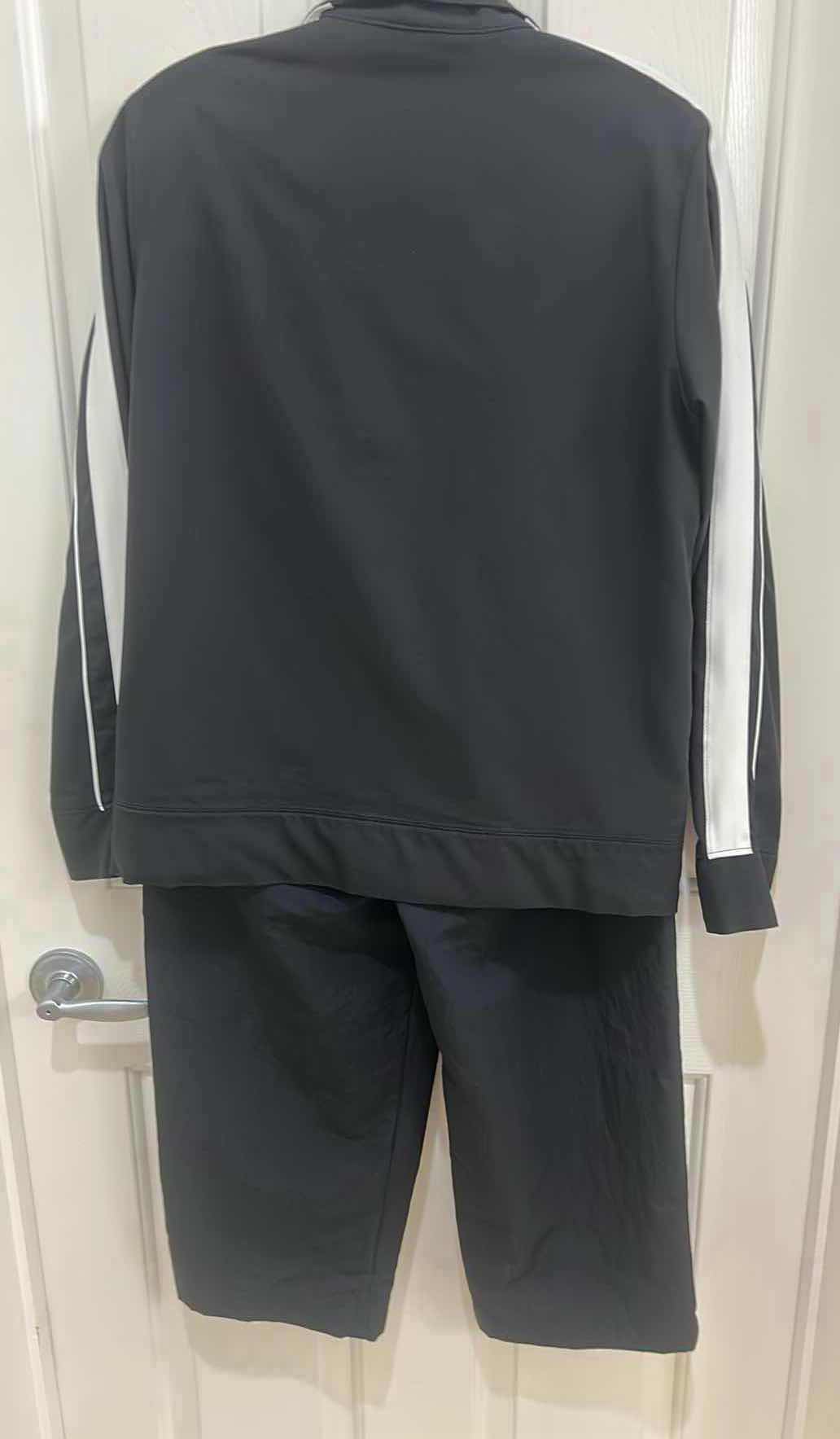 Photo 1 of NIKE DRI FIT BLACK WHITE SPRING TRACK SET (SIZE M)