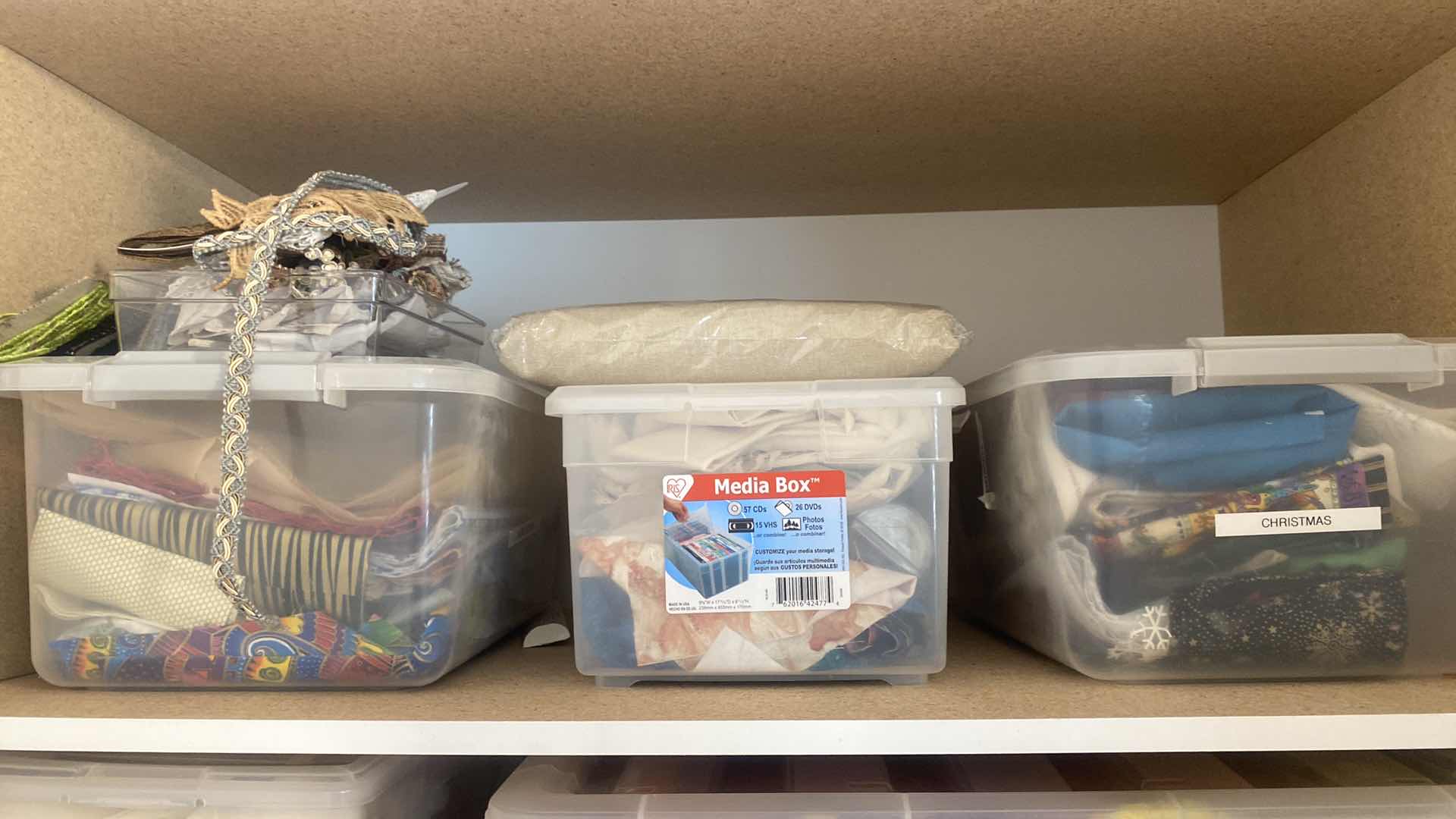 Photo 1 of FOUR SHELVES IN CABINET FABRIC AND CRAFTING SUPPLIES