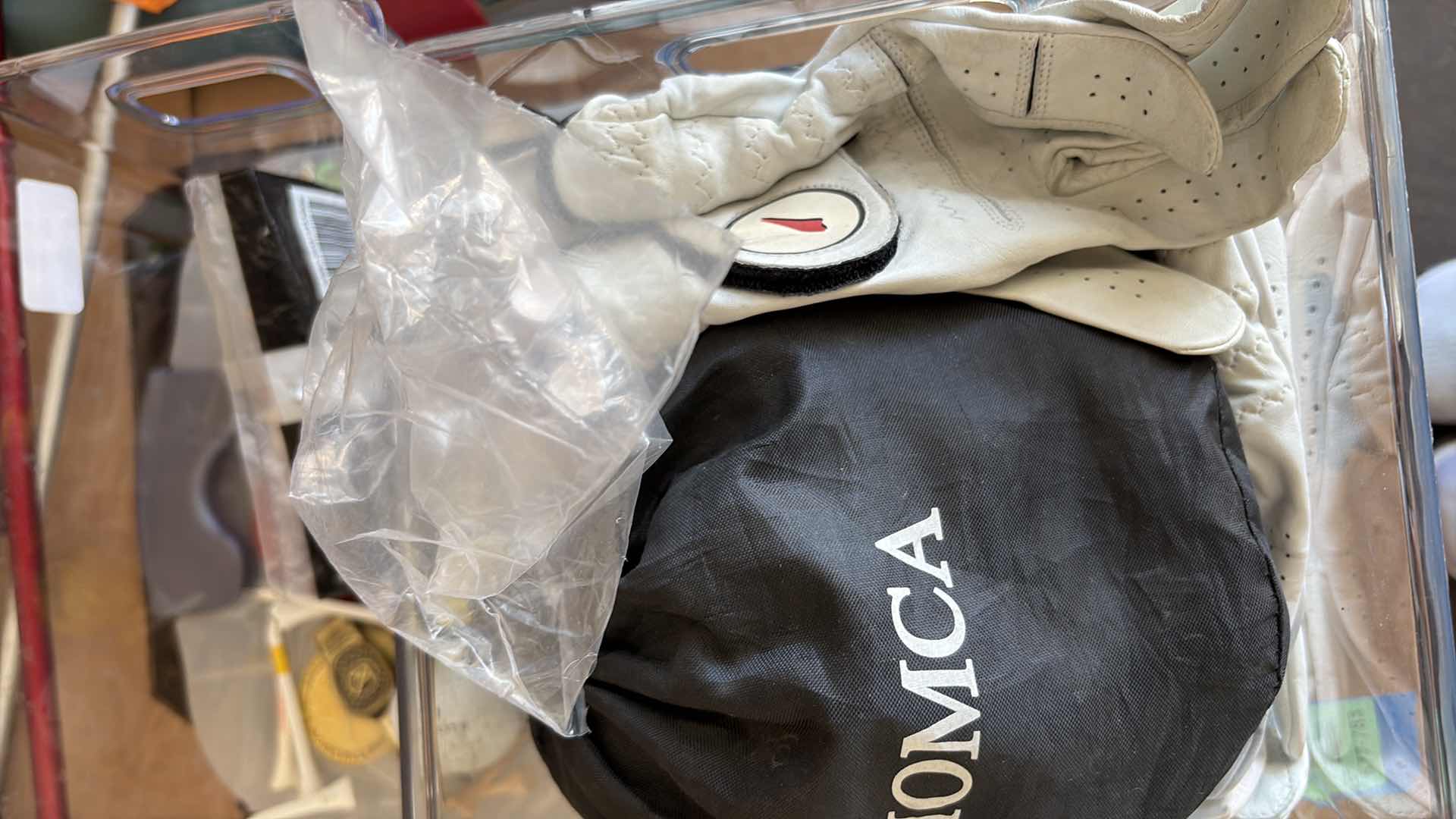 Photo 1 of BOX OF GOLF BALLS AND CLUBS L44” $230