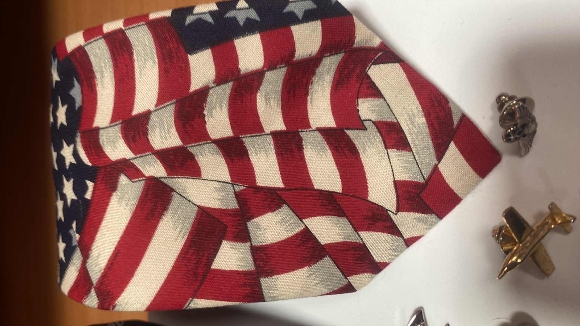 Photo 1 of MEN’S MILITARY TIE TACS & 2 PATRIOTIC TIES