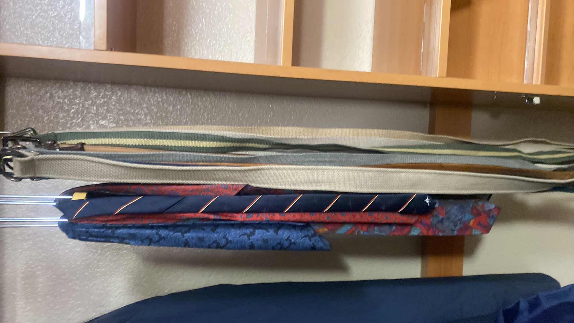Photo 1 of MEN’S TIES AND BELTS