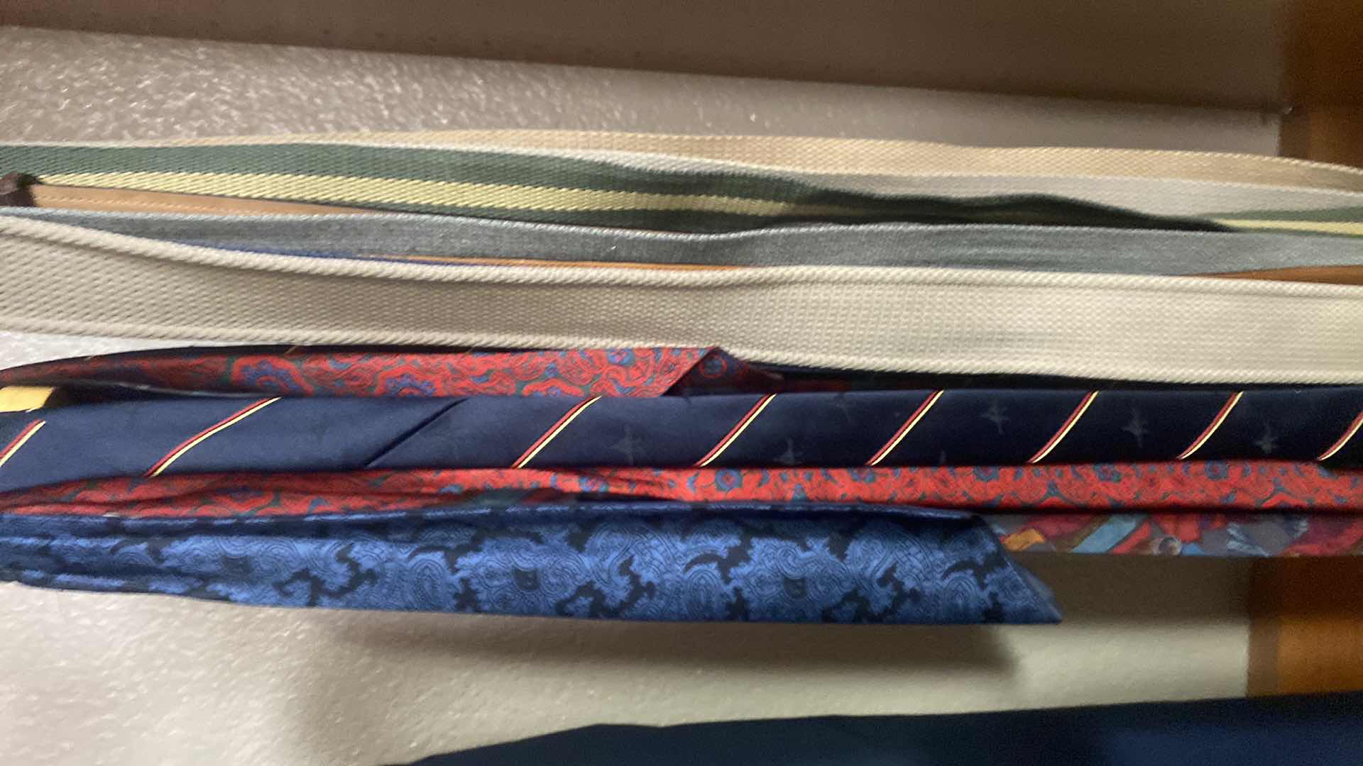 Photo 1 of MEN’S TIES AND BELTS