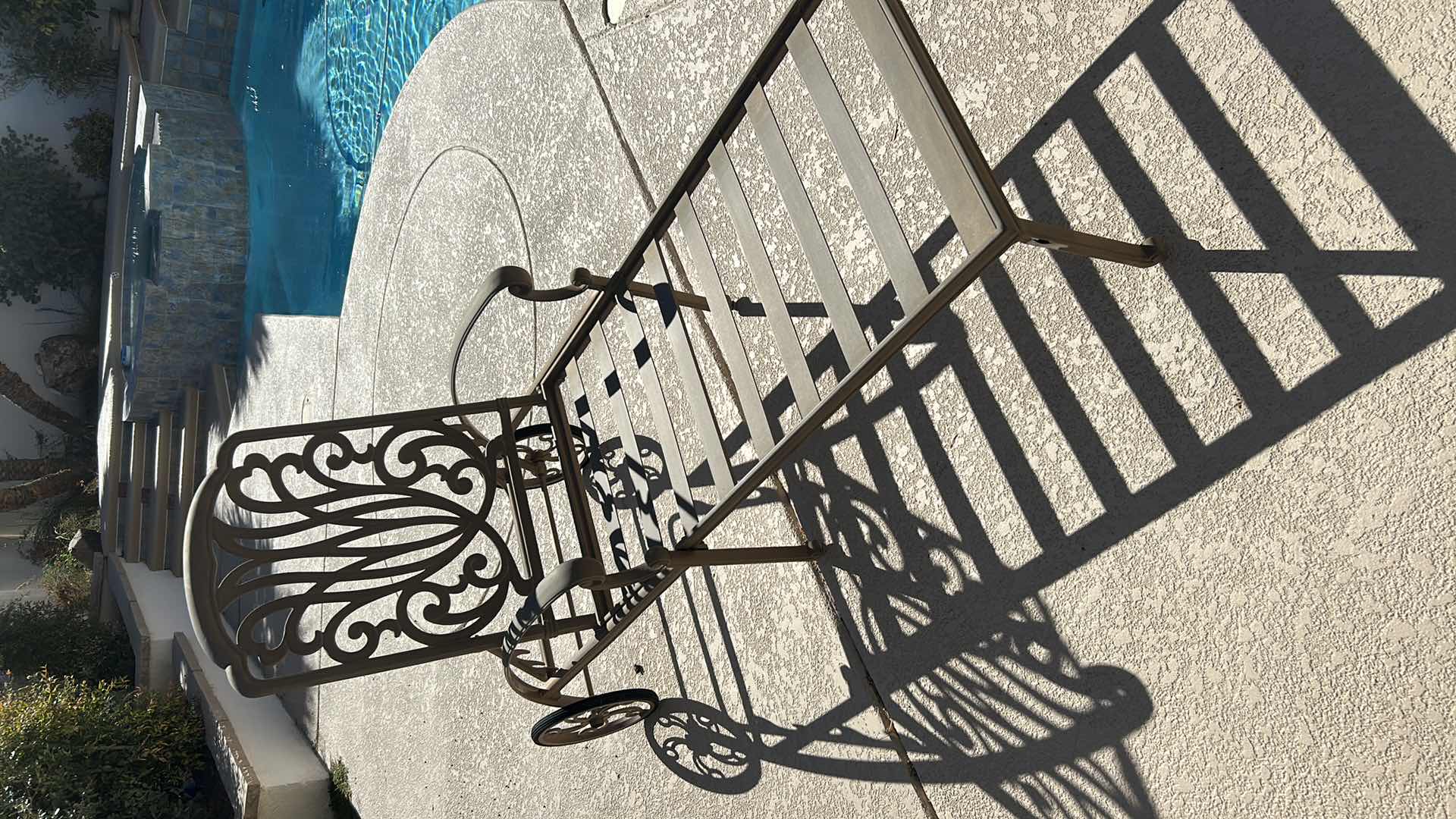 Photo 1 of OUTDOOR CHAISE CAST ALUMINUM W ANTIQUE BRONZE FINISH REAR WHEELS $1000