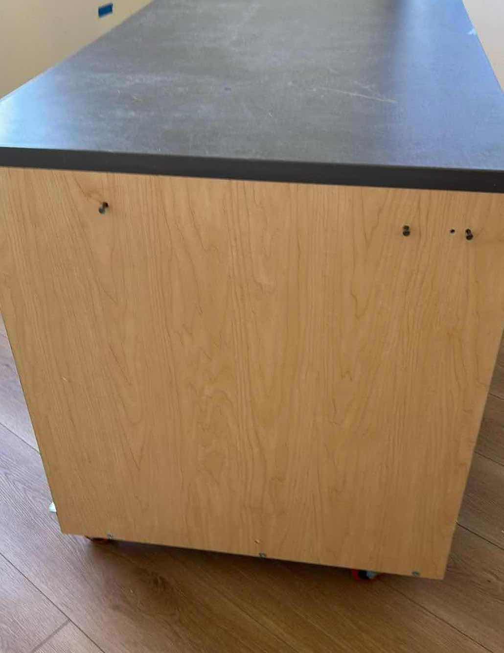 Photo 1 of DIY MOBILE CRAFT TABLE W DARK LAMINATE COUNTER TOP
$200