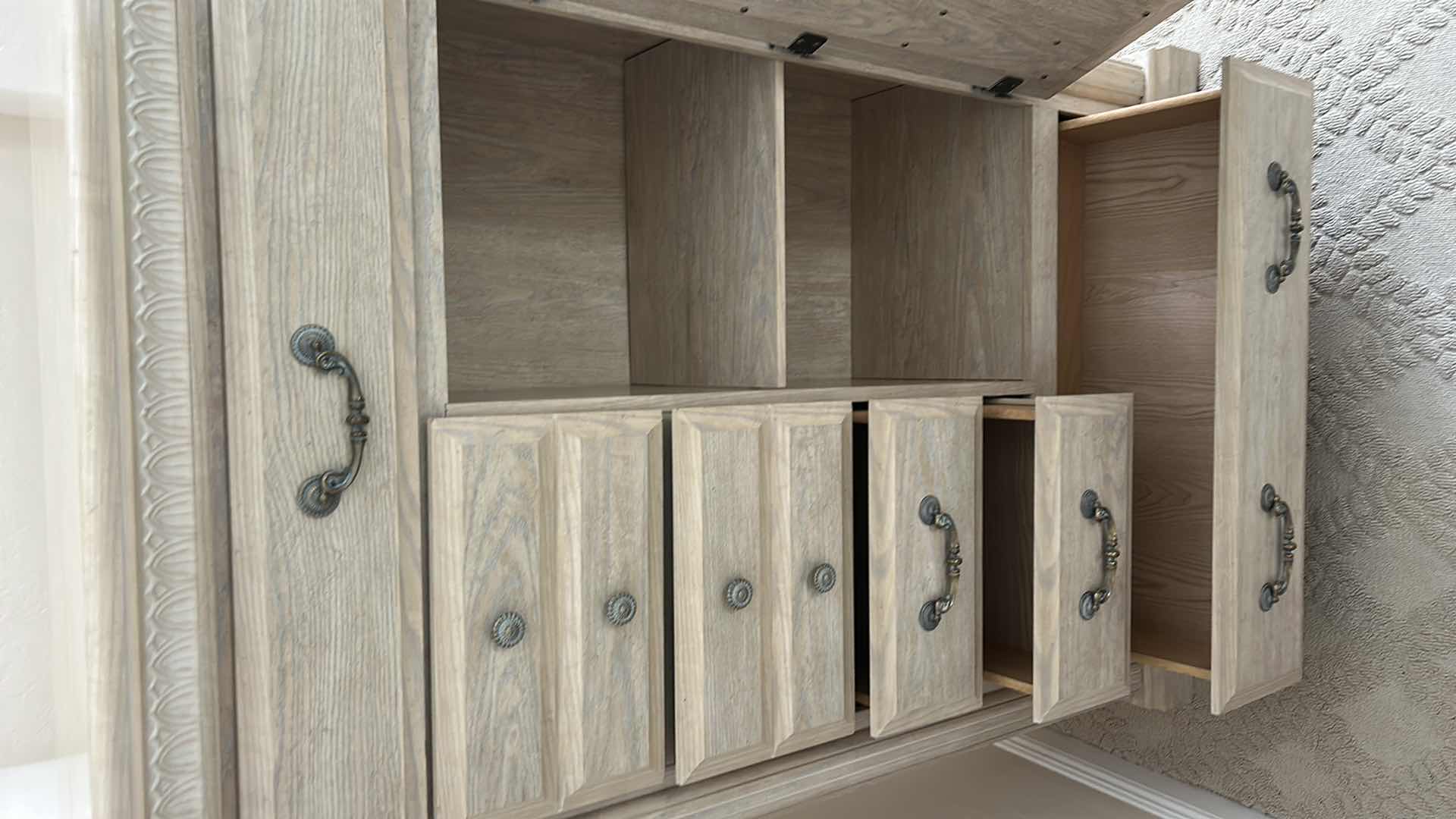 Photo 1 of LIGHT OAK GENTLEMAN’S CHEST WITH MULTIPLE DRAWERS AND CABINET DOOR 43” x 16 1/2” x H61”